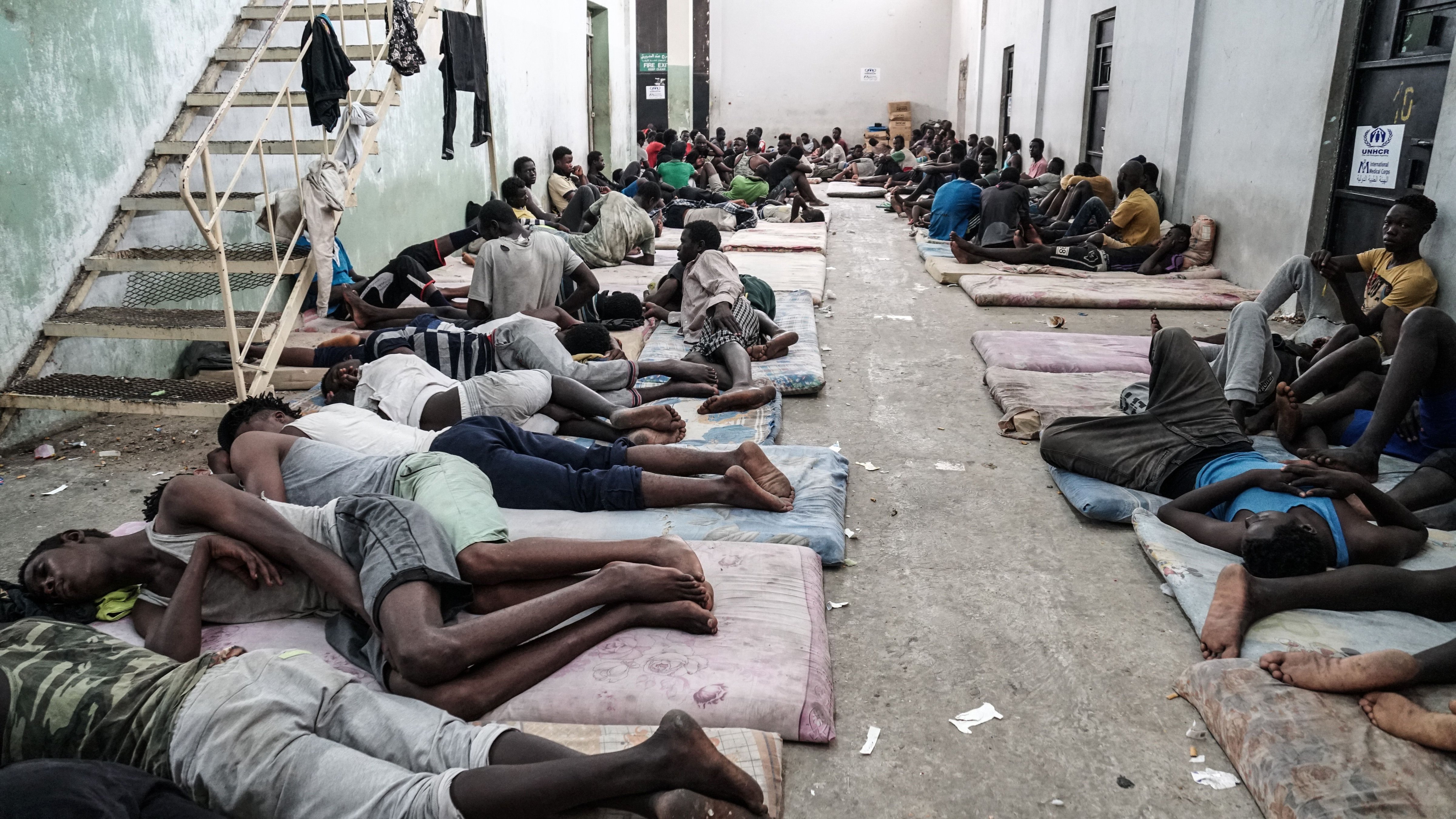 Illegal immigrants are seen at a detention centre in Zawiyah, 45 kilometres west of the Libyan capital Tripoli, on June 17, 2017. (Taha Jawashi—AFP/Getty Images)