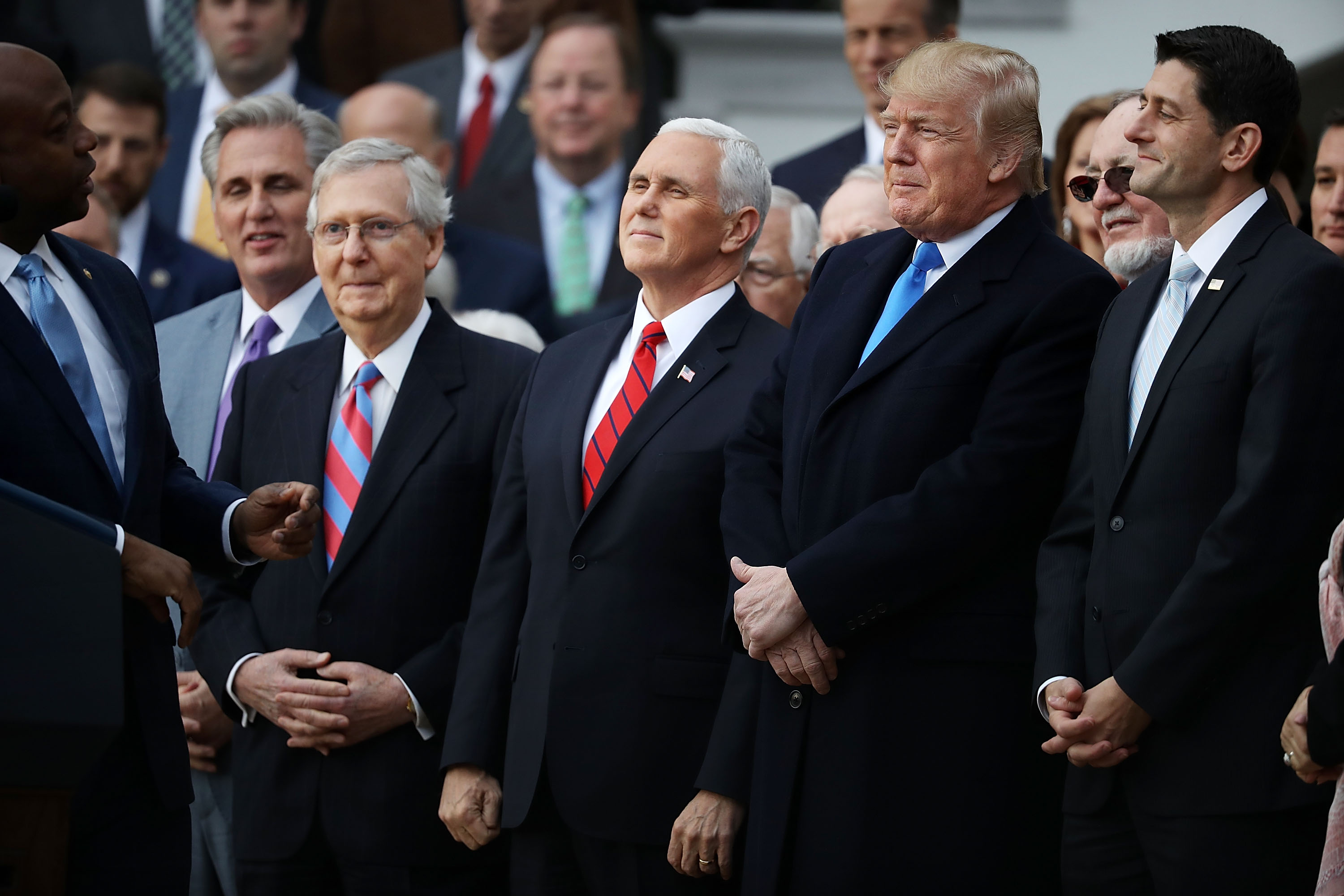 Sen. Tim Scott (R-SC) delivers remarks with House Majority Leader Kevin McCarthy (R-CA), Aenate Majority Leader Mitch McConnell (R-KY), Vice President Mike Pence, U.S. President Donald Trump and Speaker of the House Paul Ryan (R-WI) during an event celebrating the passage of the Tax Cuts and Jobs Act on the South Lawn of the White House December 20, 2017. (Chip Somodevilla—Getty Images)