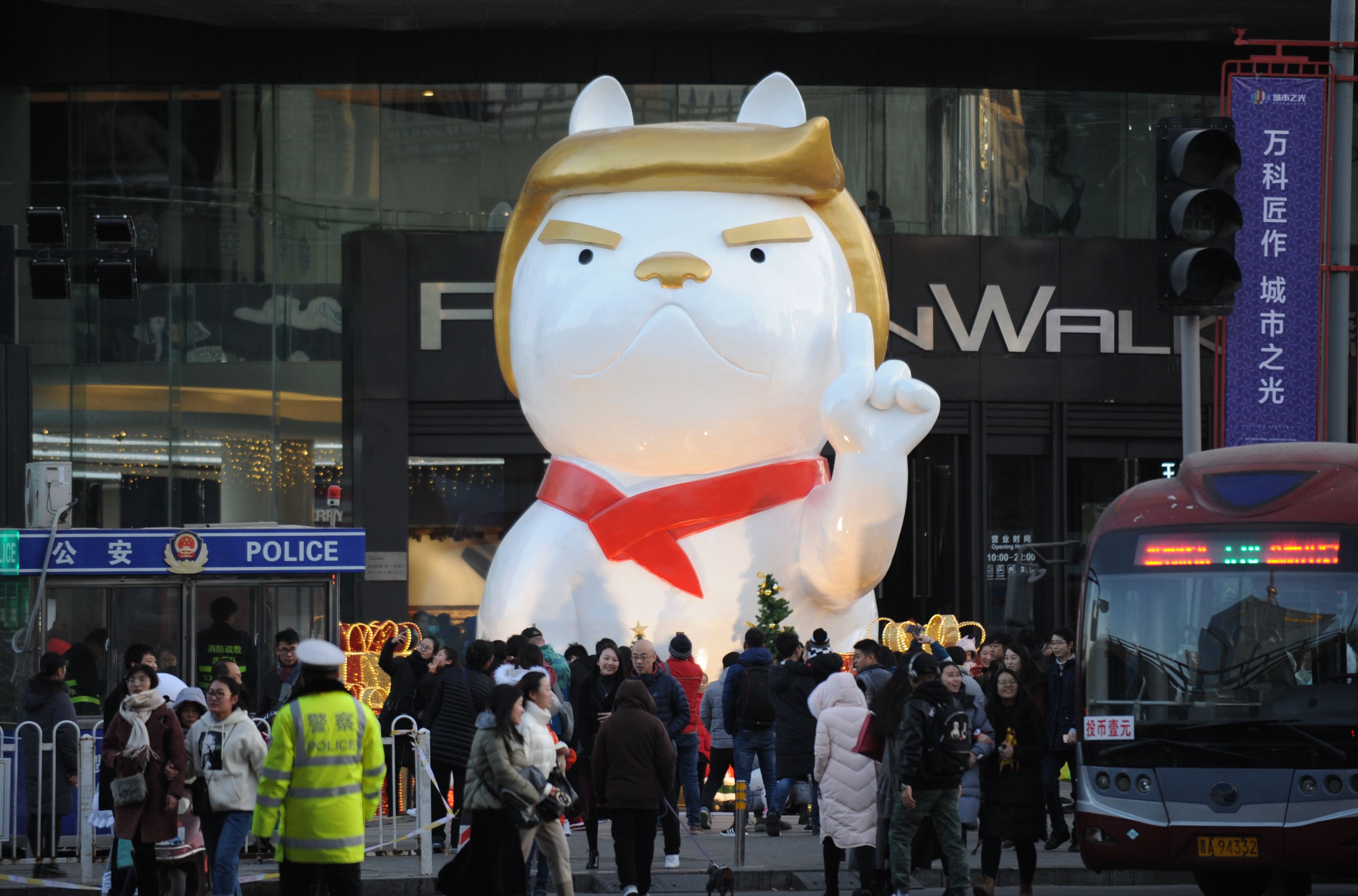A dog sculpture resembling President Donald Trump outside a shopping mall in Taiyuan, China on on Dec. 24, 2017. (Yinming—VCG/Getty Images)