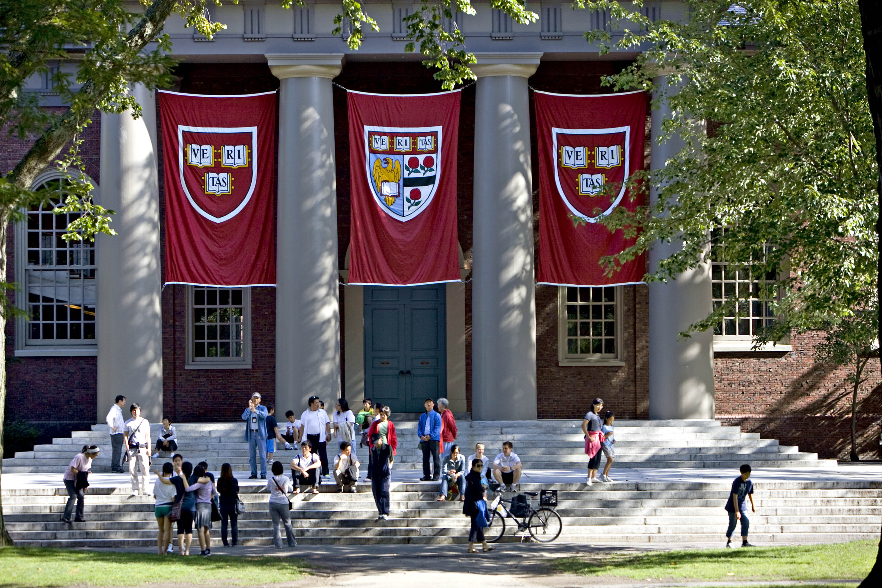 Harvard banners hang outside Memorial Church on the Harvard University campus in Cambridge, Massachusetts, U.S., on Friday, Sept. 4, 2009. (Bloomberg—Bloomberg via Getty Images)