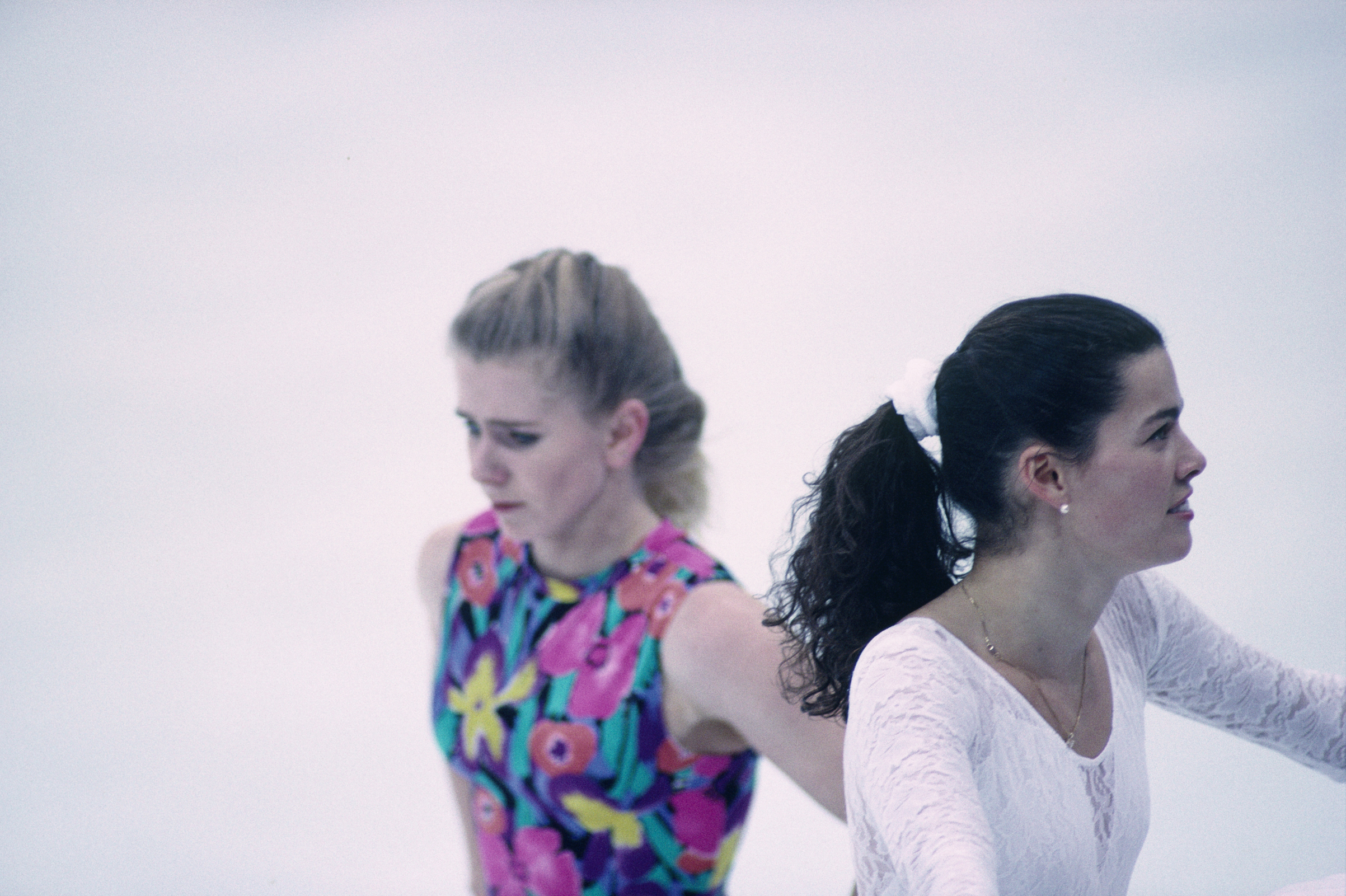 Tonya Harding (L) and Nancy Kerrigan, both from USA, during a training session of the 1994 Winter Olympics. (Dimitri Iundt—Corbis/VCG/Getty Images)