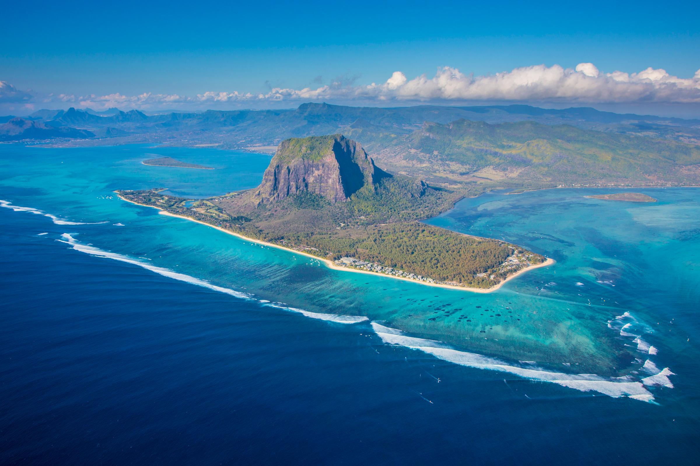 Mauritius, Riviere Noire, Le Morne Brabant, Aerial view of peninsular and mountain
