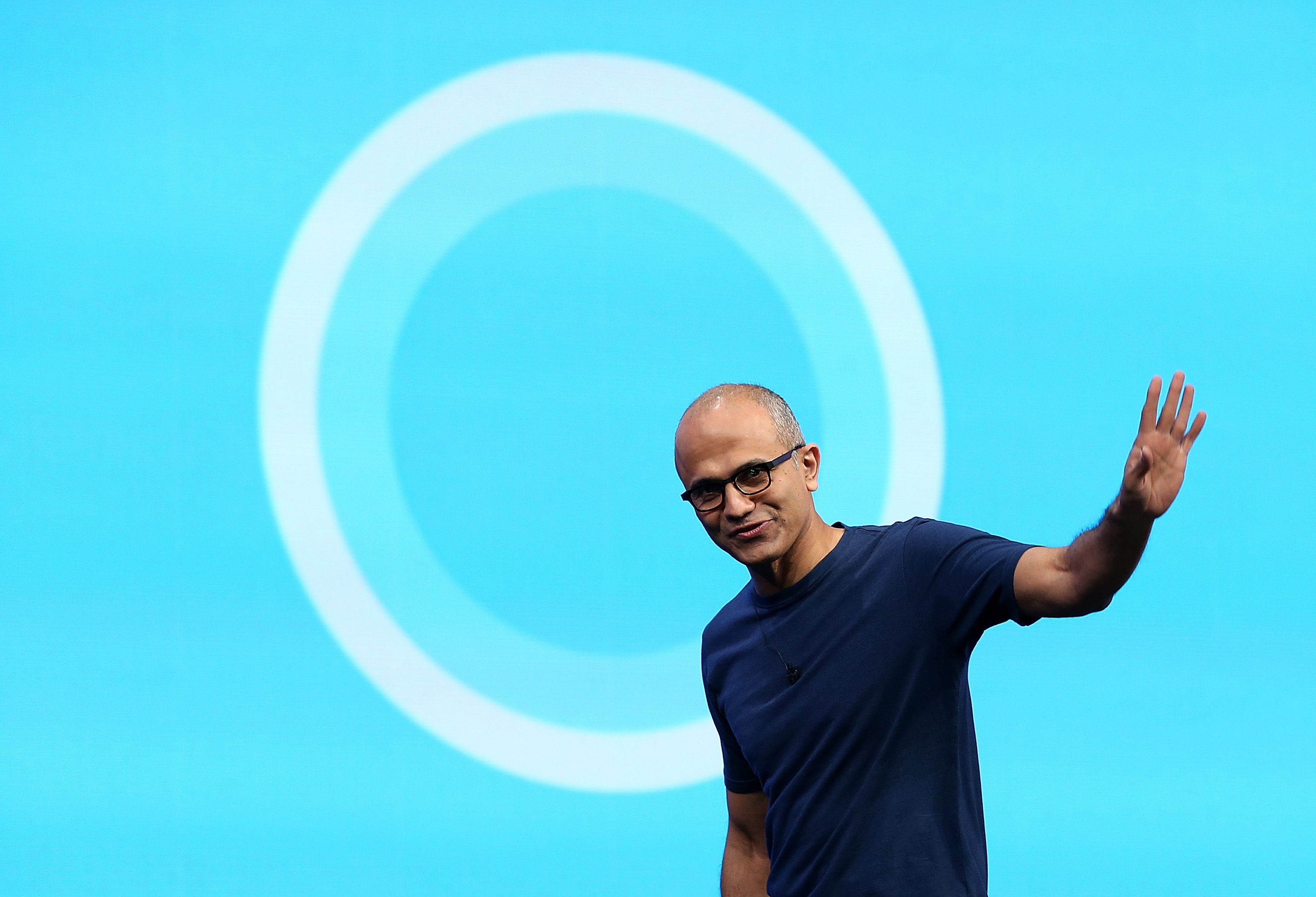 Microsoft CEO Satya Nadella walks in front of the new Cortana logo as he delivers a keynote address during the 2014 Microsoft Build developer conference on April 2, 2014 in San Francisco, California. (Justin Sullivan&mdash;Getty Images)