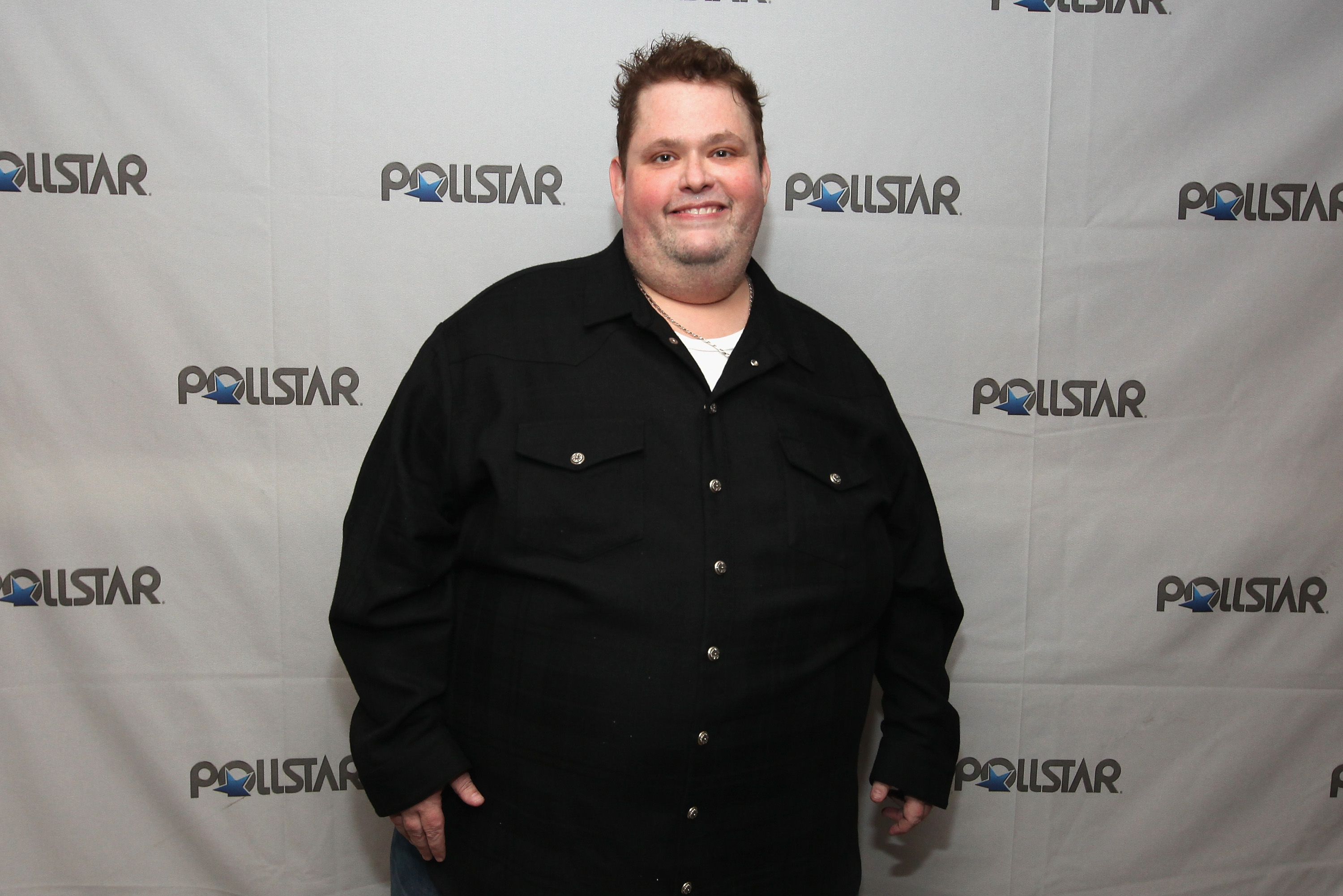 Host Ralphie May poses backstage during the 26th Annual PollStar Awards at Ryman Auditorium on February 21, 2015 in Nashville, Tennessee. (Barry Brecheisen&mdash;Getty Images)