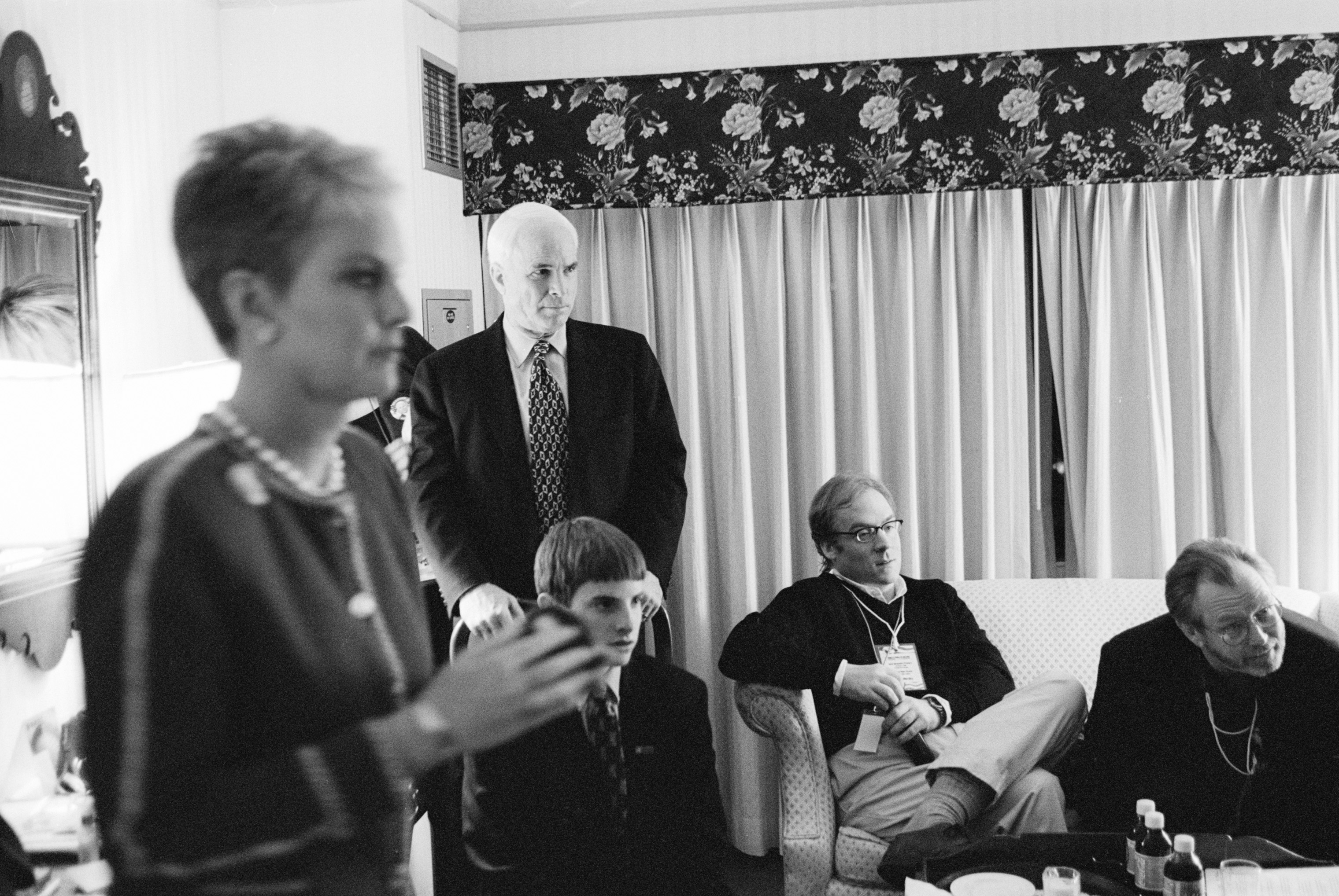 Presidential candidate John McCain with his family and members of his campaign team watching the progress of the state primary in N.H. on Feb. 1, 2000. (David Hume Kennerly—Getty Images)