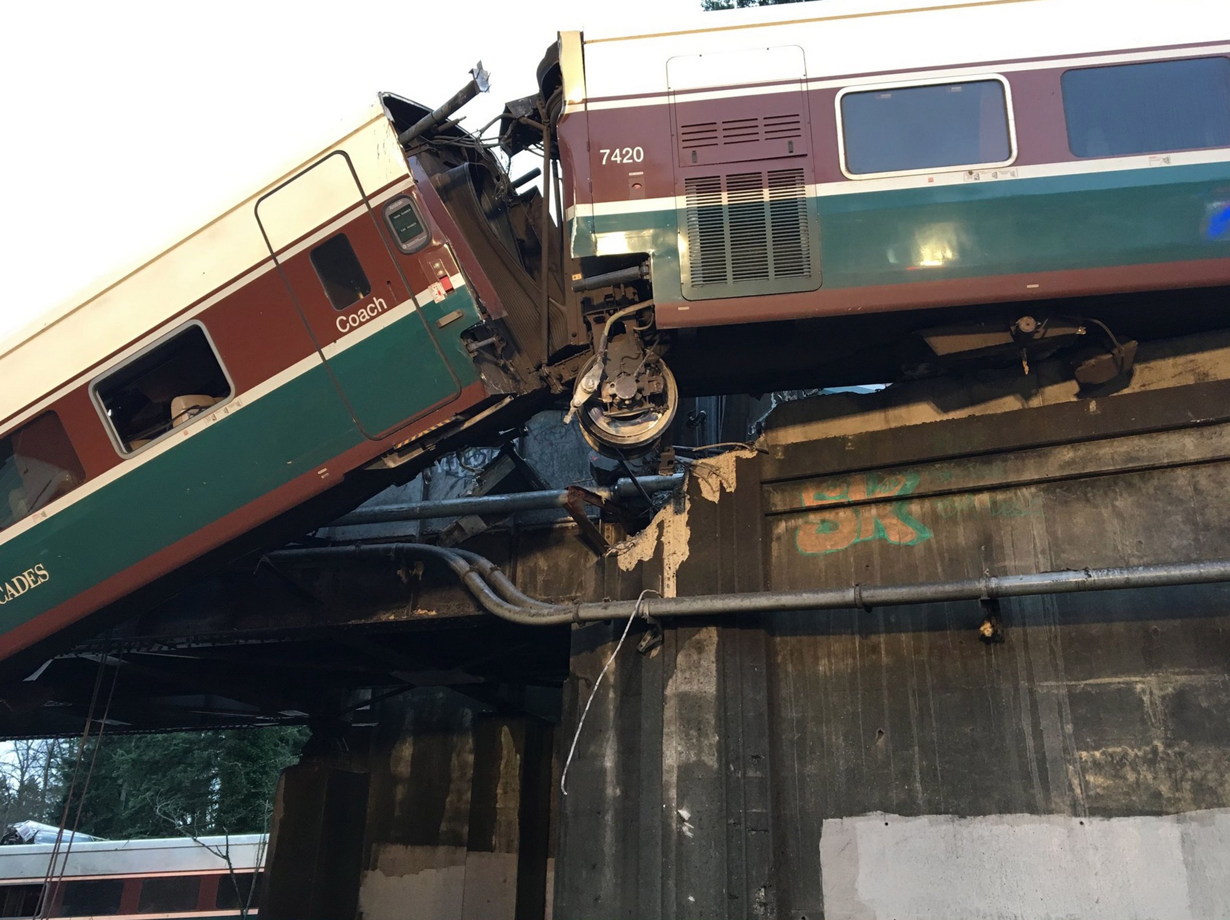 A handout photo made available by the Pierce County Sheriffs Department showing Amtrak train 501 which derailed onto Interstate 5 near Olympia, Washington — Shutterstock/AP (HANDOUT/EPA-EFE/REX/Shutterstock&mdash;HANDOUT/EPA-EFE/REX/Shutterstock)