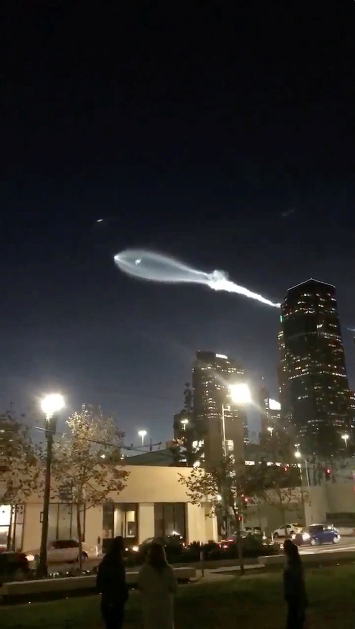 SpaceX's Falcon 9 rocket lifts off in the air, as seen from Los Angeles, California