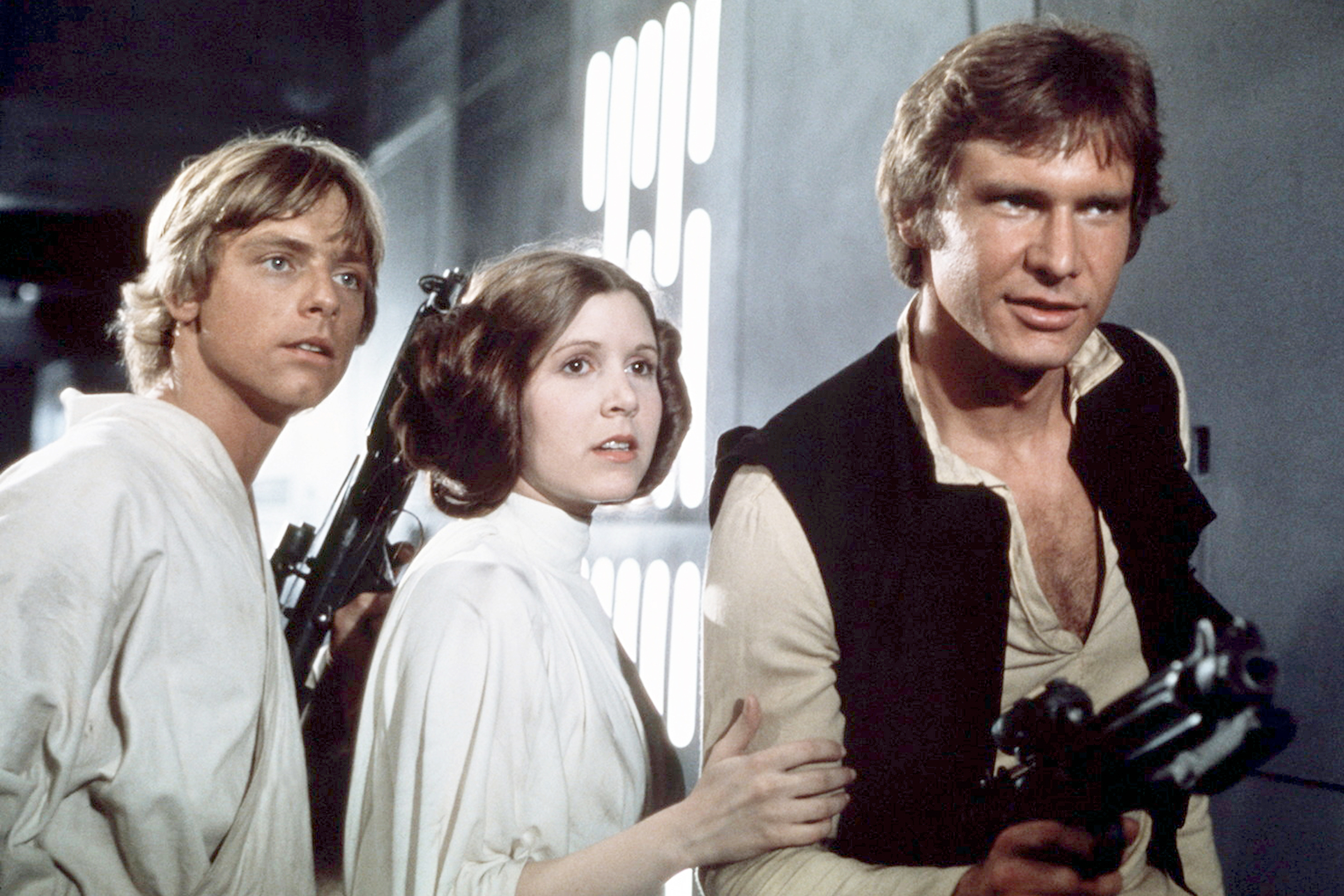 American actors Mark Hamill, Carrie Fisher and Harrison Ford on the set of Star Wars: Episode IV - A New Hope. (Sunset Boulevard/Corbis/Getty Images)