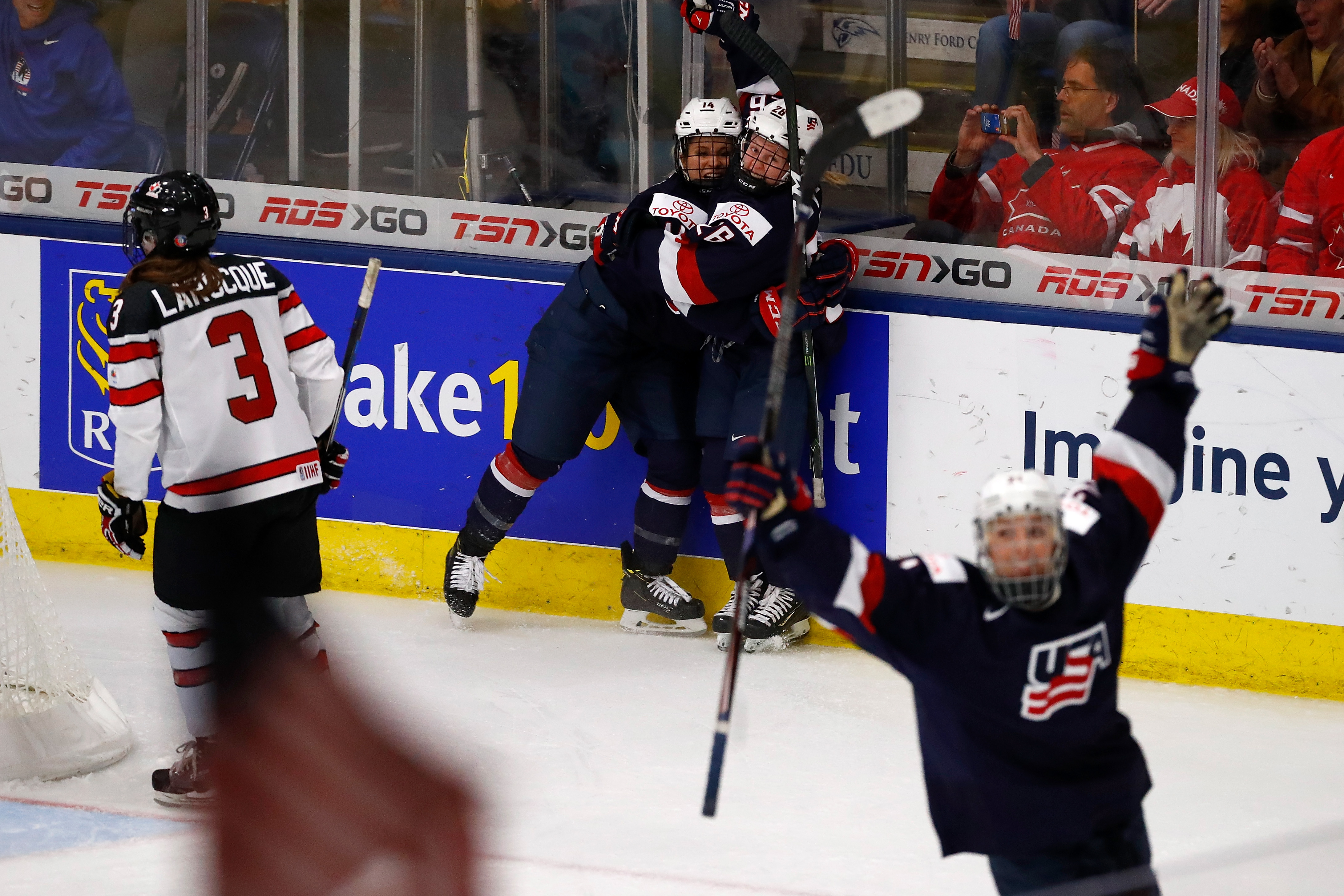 Brianna Decker #14 and Kendall Coyne #26 of the United States celebrate a game winning overtime goal at the 2017 IIHF Woman's World Championships at USA Hockey Arena on April 7, 2017 in Plymouth, Michigan. Gregory Shamus—Getty Images. (Gregory Shamus—Getty Images.)