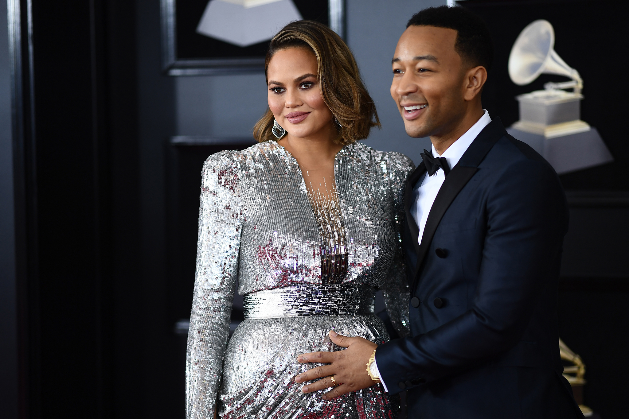 John Legend and Chrissy Teigen arrive for the 60th Grammy Awards on Jan. 28, 2018, in New York.