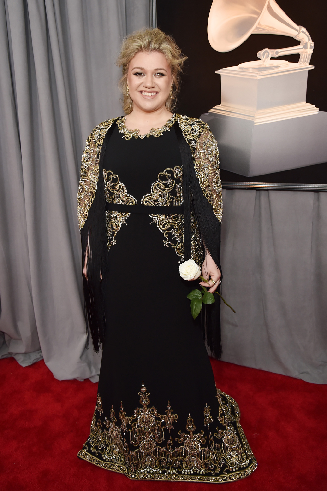 Recording artist Kelly Clarkson, white rose detail, attends the 60th Annual GRAMMY Awards at Madison Square Garden on January 28, 2018 in New York City.