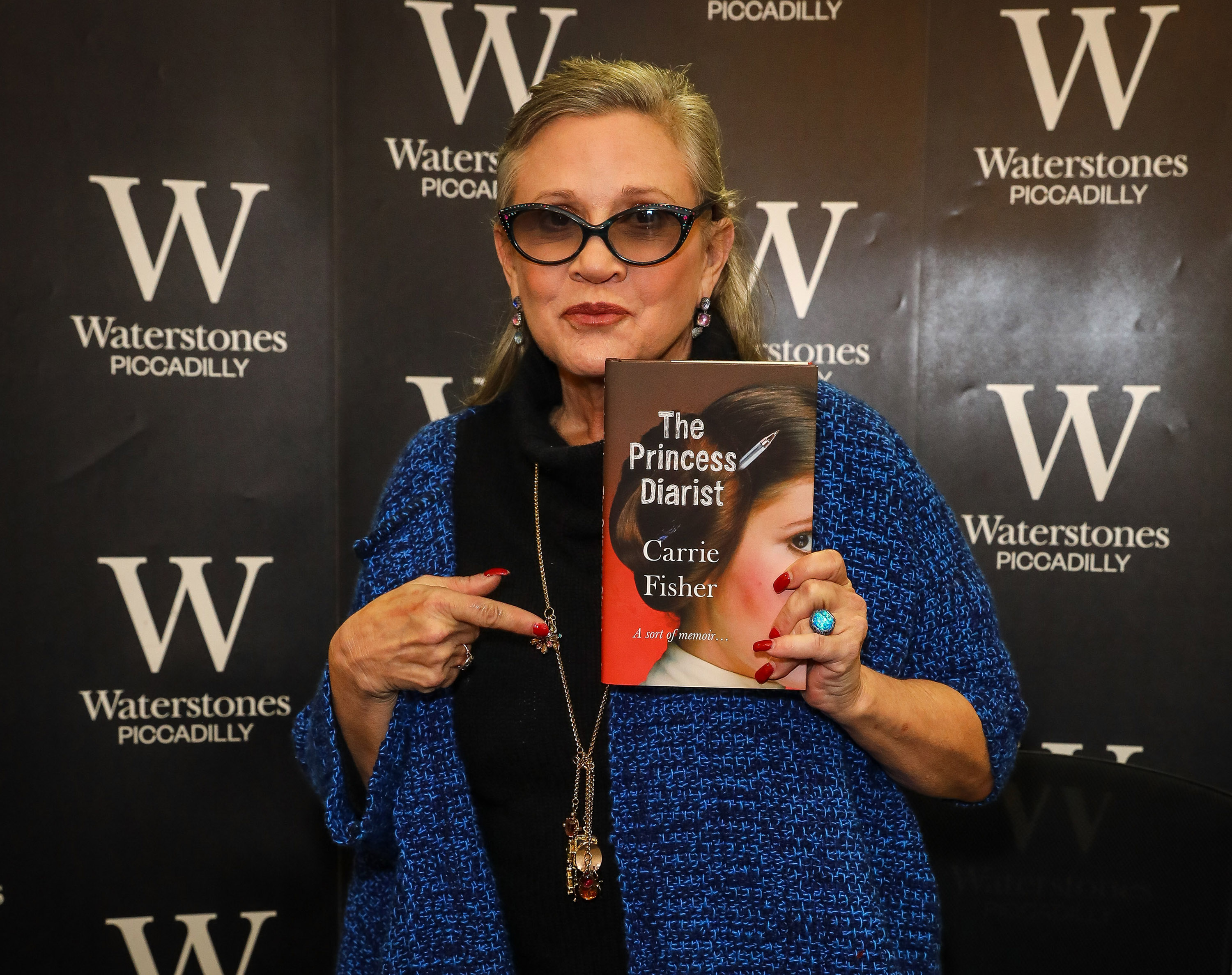 Carrie Fisher Signs Copies Of Her New Book "The Princess Diarist" At Waterstones Piccadilly