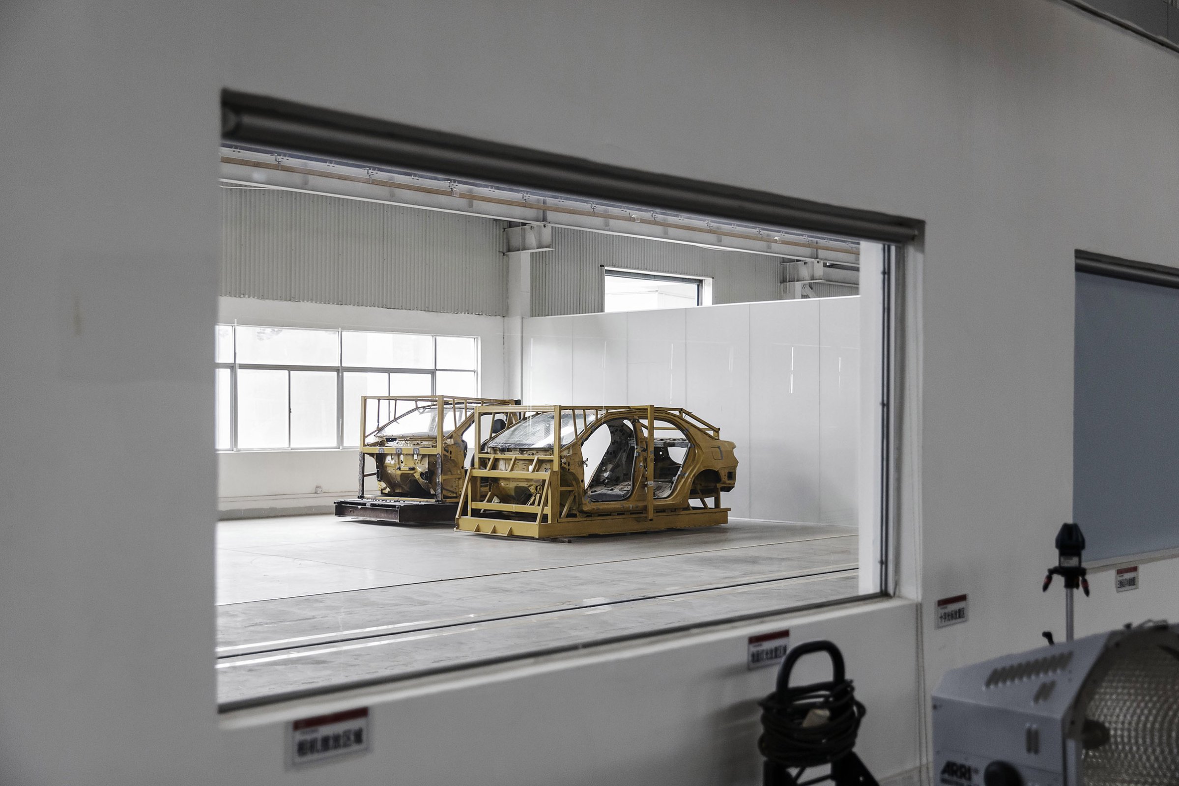 Vehicle frames await testing in leading car­maker BYD’s lab in Shenzhen, China