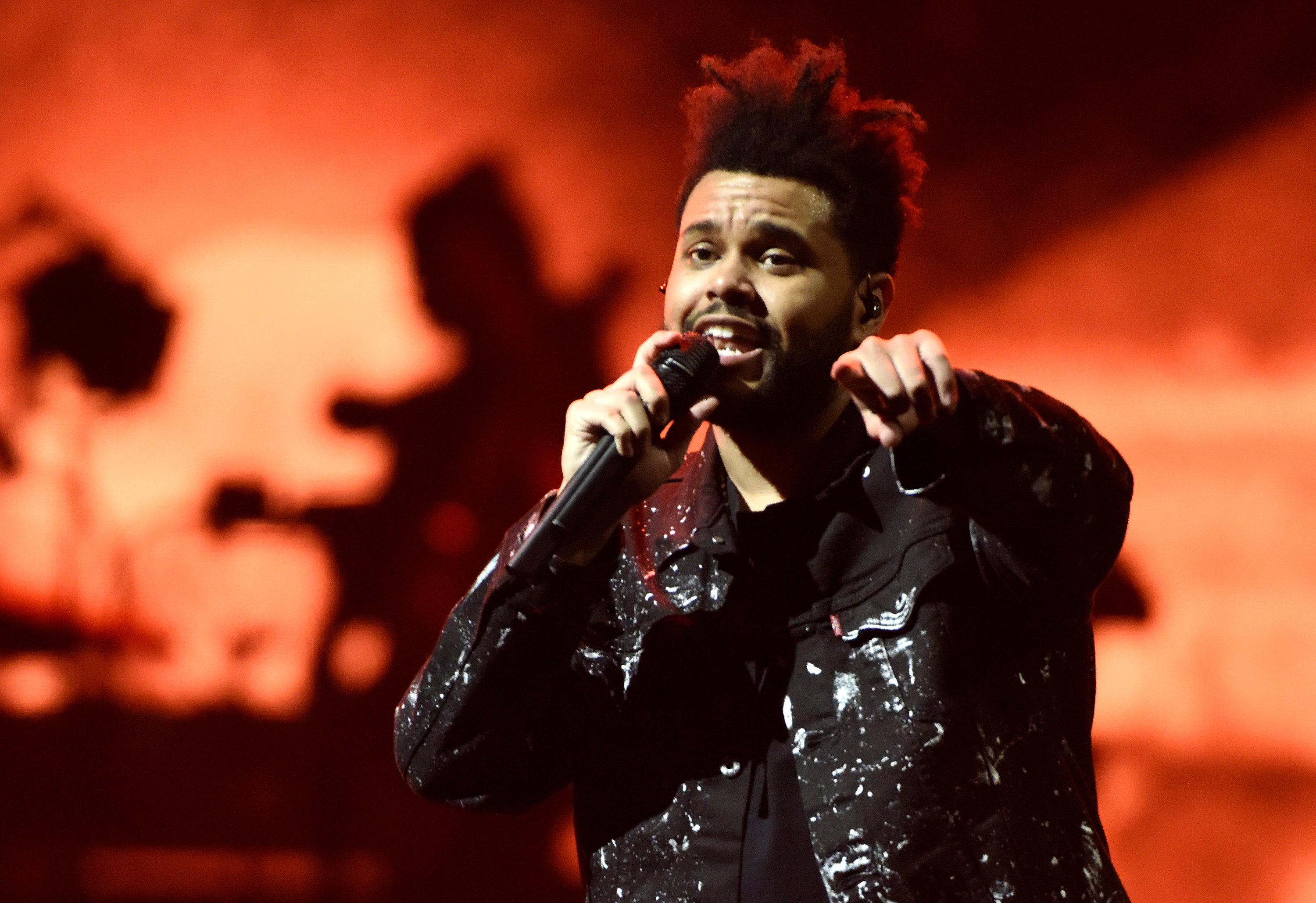 The Weeknd performs during his "Starboy World Tour" at Golden 1 Center on October 11, 2017 in Sacramento, California. (Tim Mosen—Getty Images)