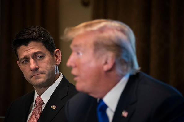 House Speaker Paul Ryan looks on as President Donald Trump speaks about tax reform legislation during a meeting with members of the House Ways and Means Committee in the Cabinet Room at the White House, November 2, 2017 in Washington, DC.