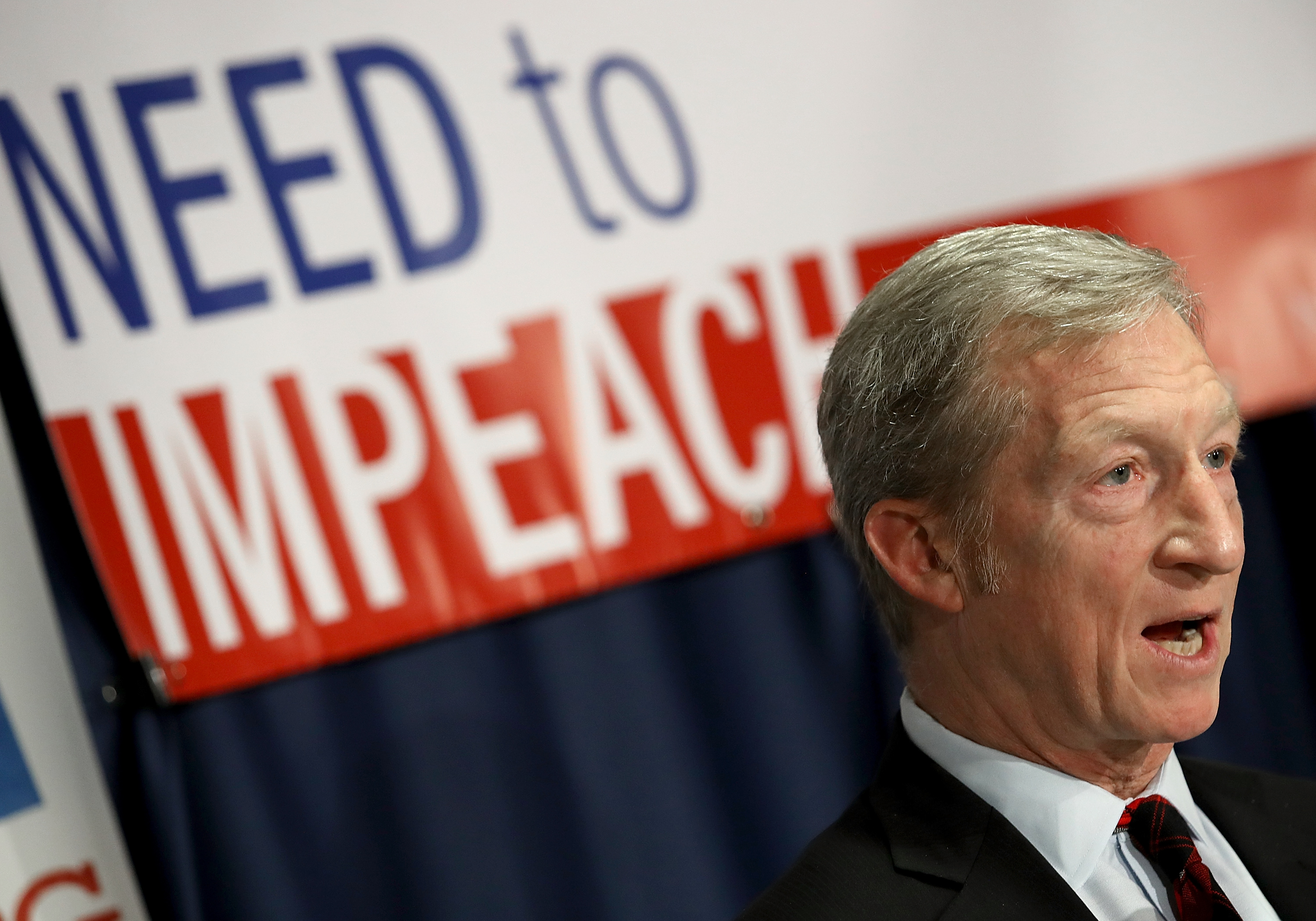 Billionaire hedge fund manager and philanthropist Tom Steyer speaks during a press conference at the National Press Club December 6, 2017 in Washington, DC. Steyer, founder of the "Need To Impeach" initiative, presented legal grounds calling for the impeachment investigation of U.S. President Donald Trump during the press conference. (Win McNamee—Getty Images)