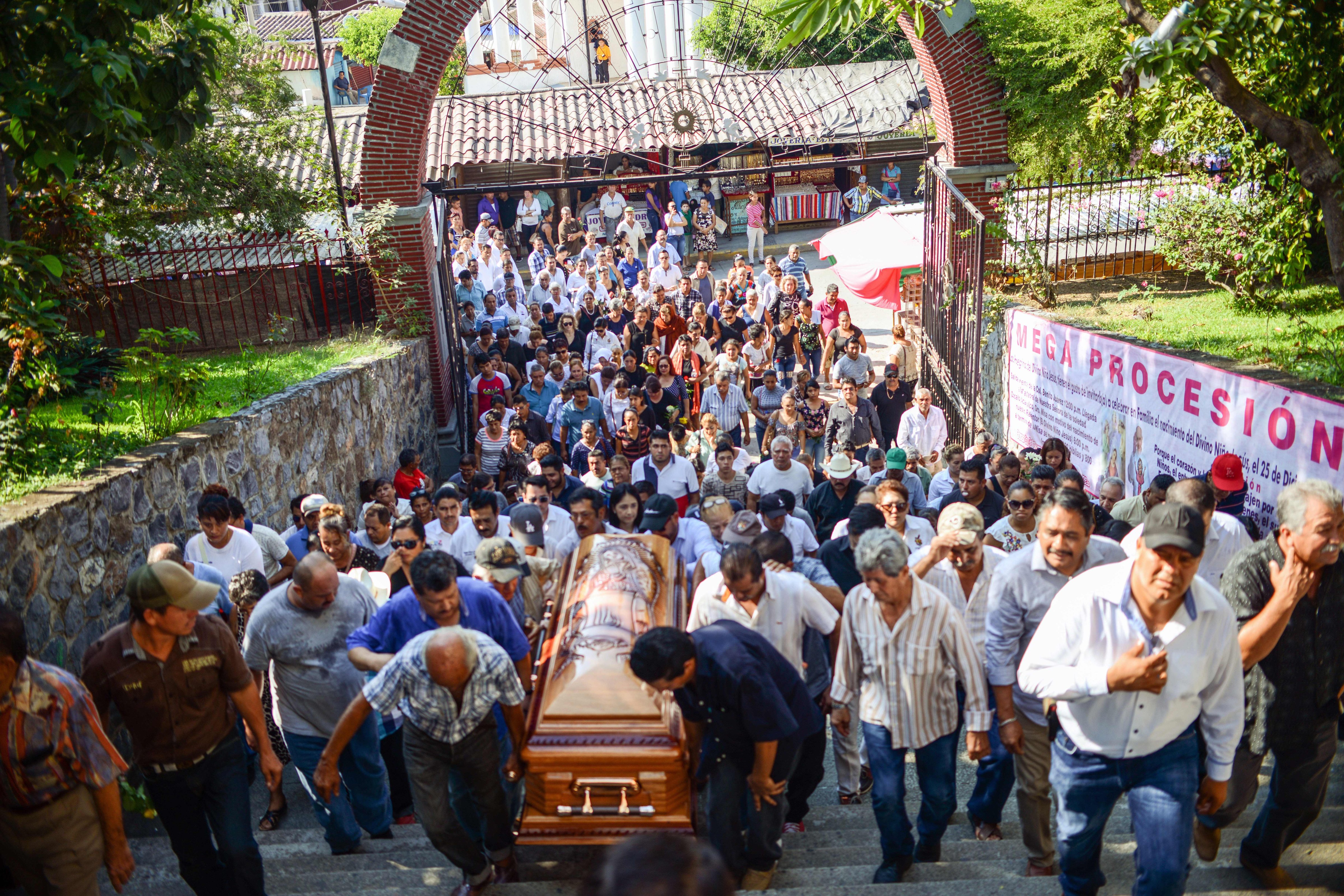 The funeral of Petatlan mayor Arturo Gomez in Guerrero State, Mexico on Dec. 29, 2017. (Francisco Robles—AFP/Getty Images)