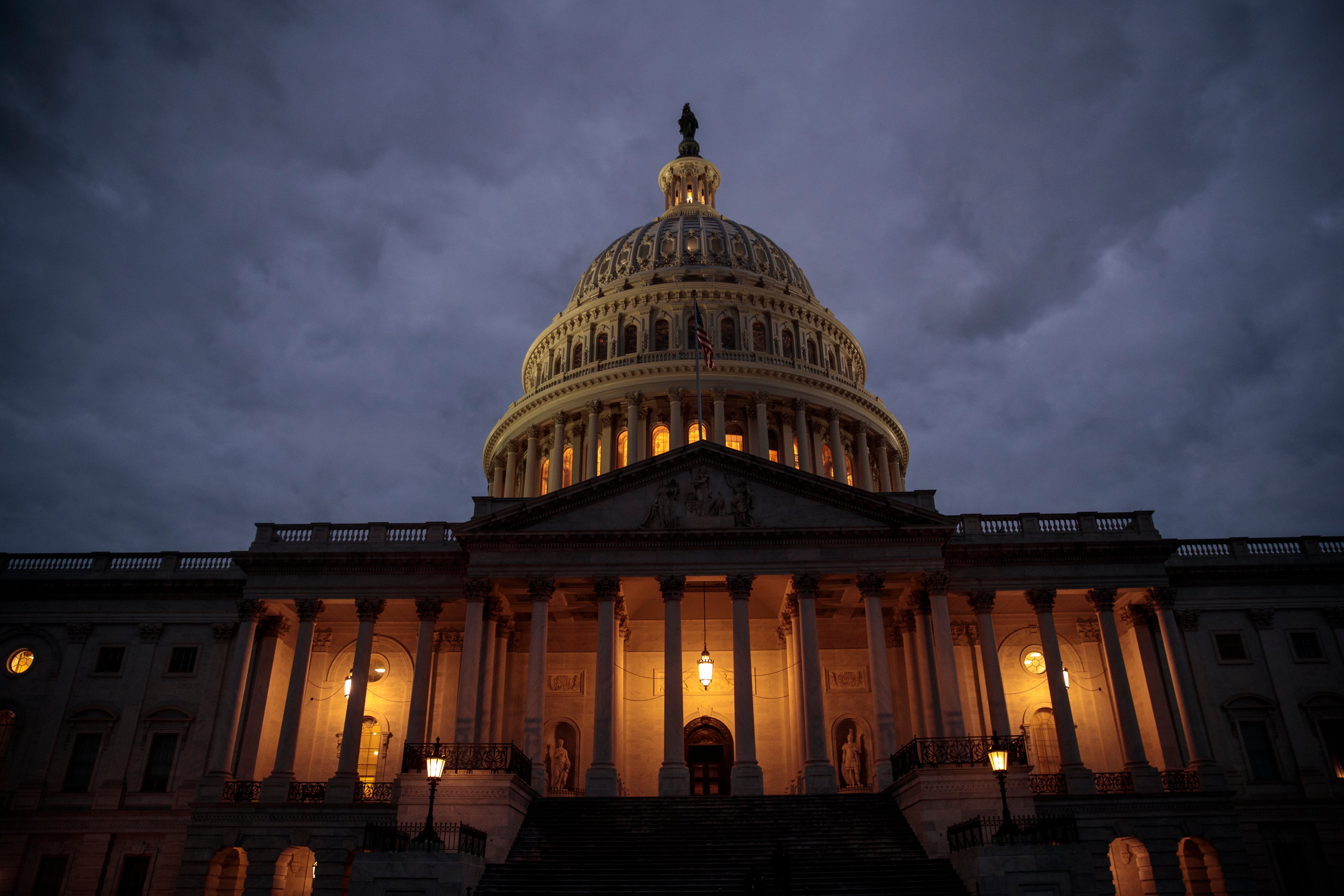 WASHINGTON, DC - JANUARY 21:  The U.S. Capitol is seen at dusk, January 21, 2018 in Washington, DC. Lawmakers are convening for a Sunday session to try to resolve the government shutdown. (Photo by Drew Angerer/Getty Images) (Drew Angerer&mdash;Getty Images)