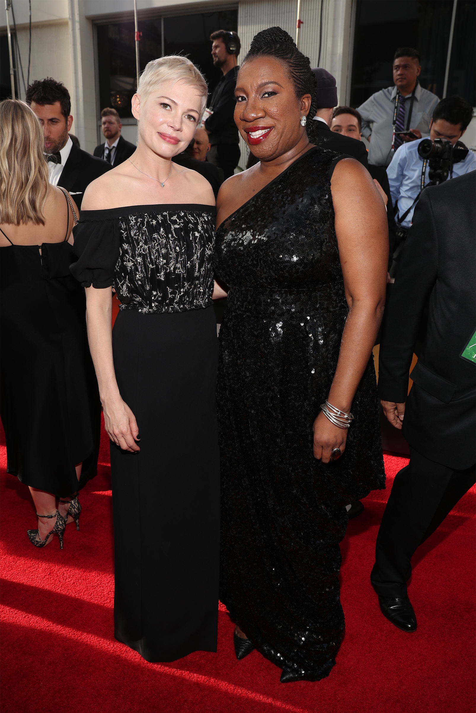 Actor Michelle Williams and activist Tarana Burke arrive to the 75th Annual Golden Globe Awards held at the Beverly Hilton Hotel on January 7, 2018. (Christopher Polk— NBC/Getty Images)