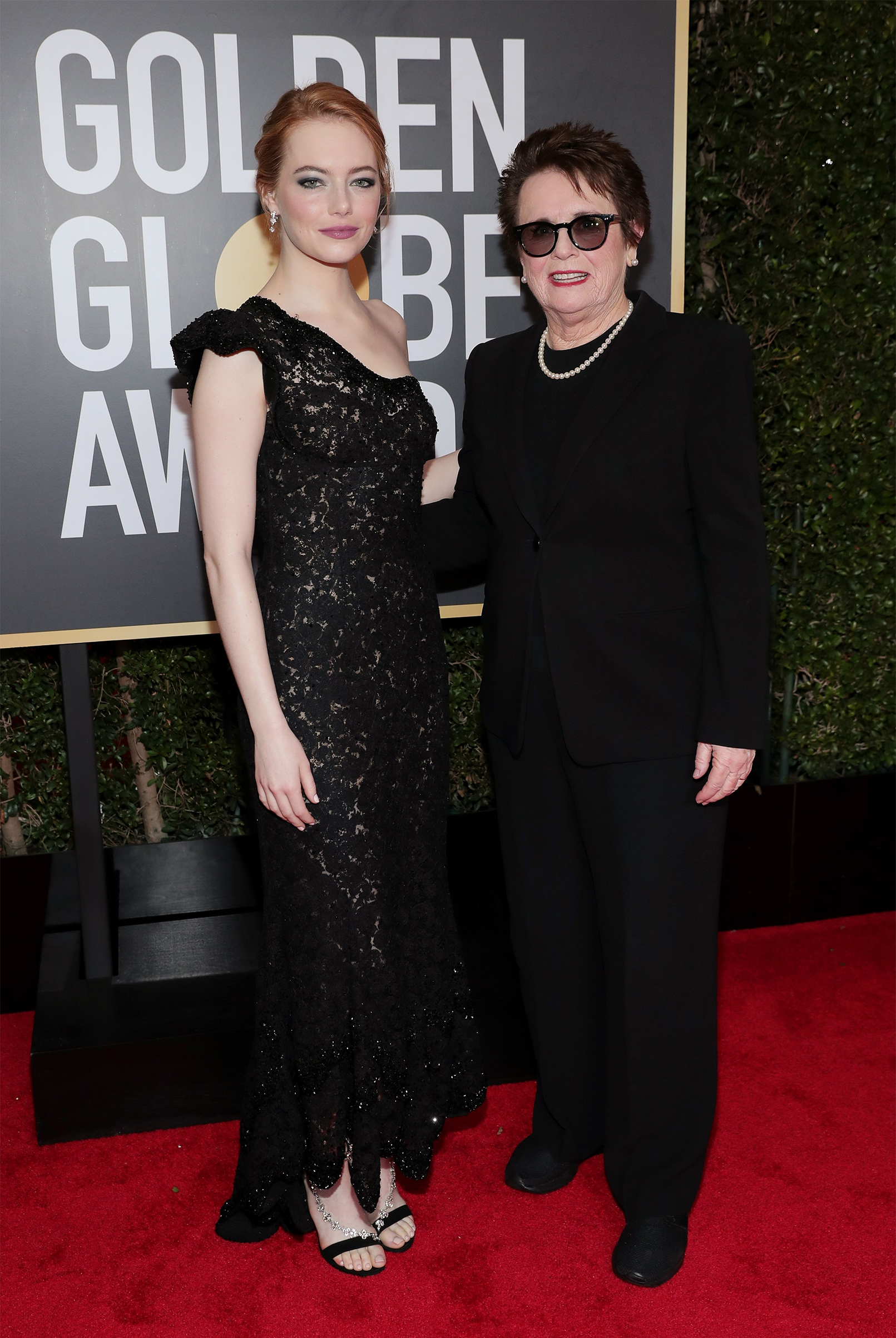Actor Emma Stone and tennis player Billie Jean King arrive to the 75th Annual Golden Globe Awards held at the Beverly Hilton Hotel on Jan. 7, 2018. (Neilson Barnard—NBC/Getty Images)