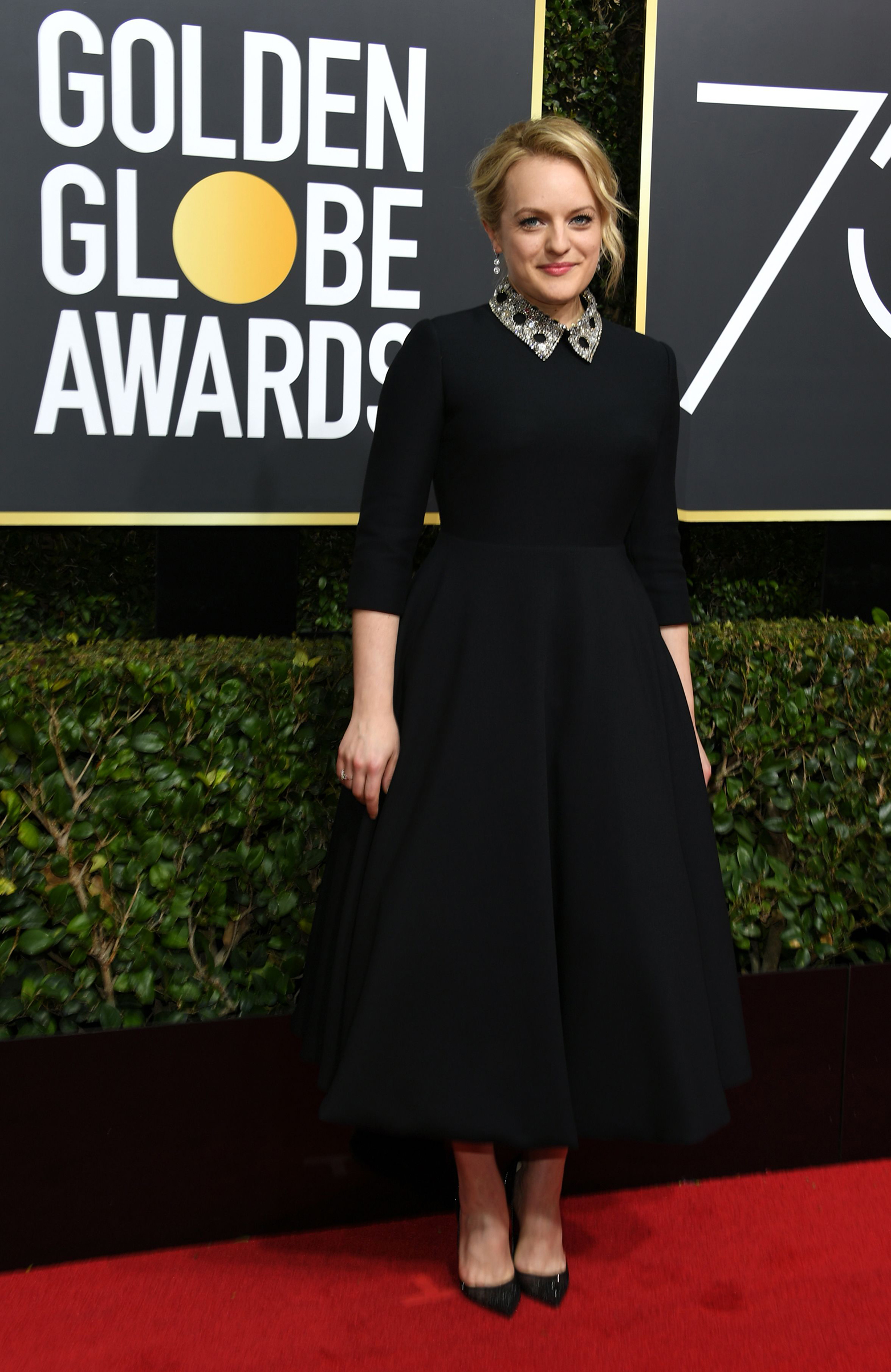 Actress Elisabeth Moss arrives for the 75th Golden Globe Awards on January 7, 2018, in Beverly Hills, California.
