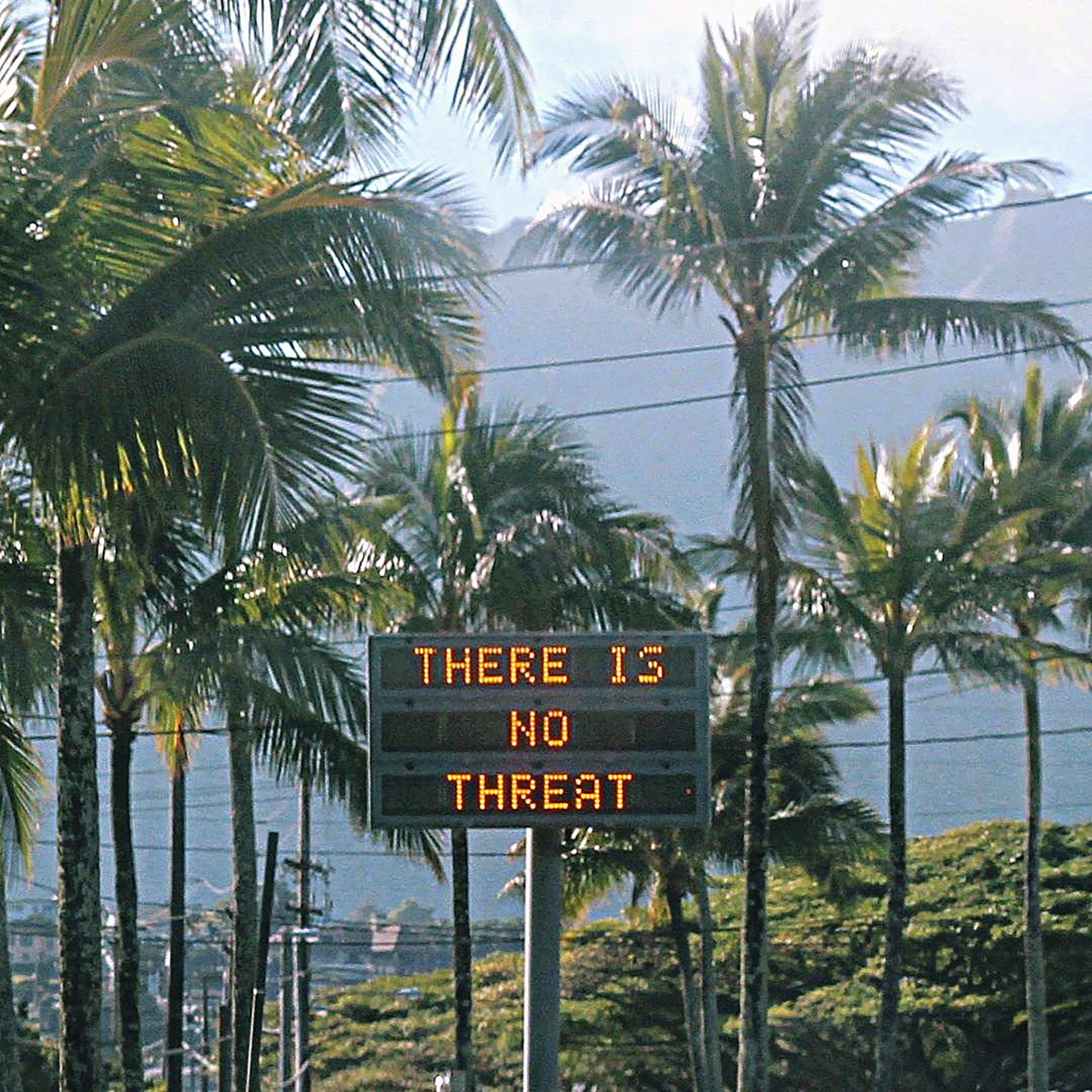 An electronic sign on the Hawaiian island of Oahu attempts to allay fears about a missile threat