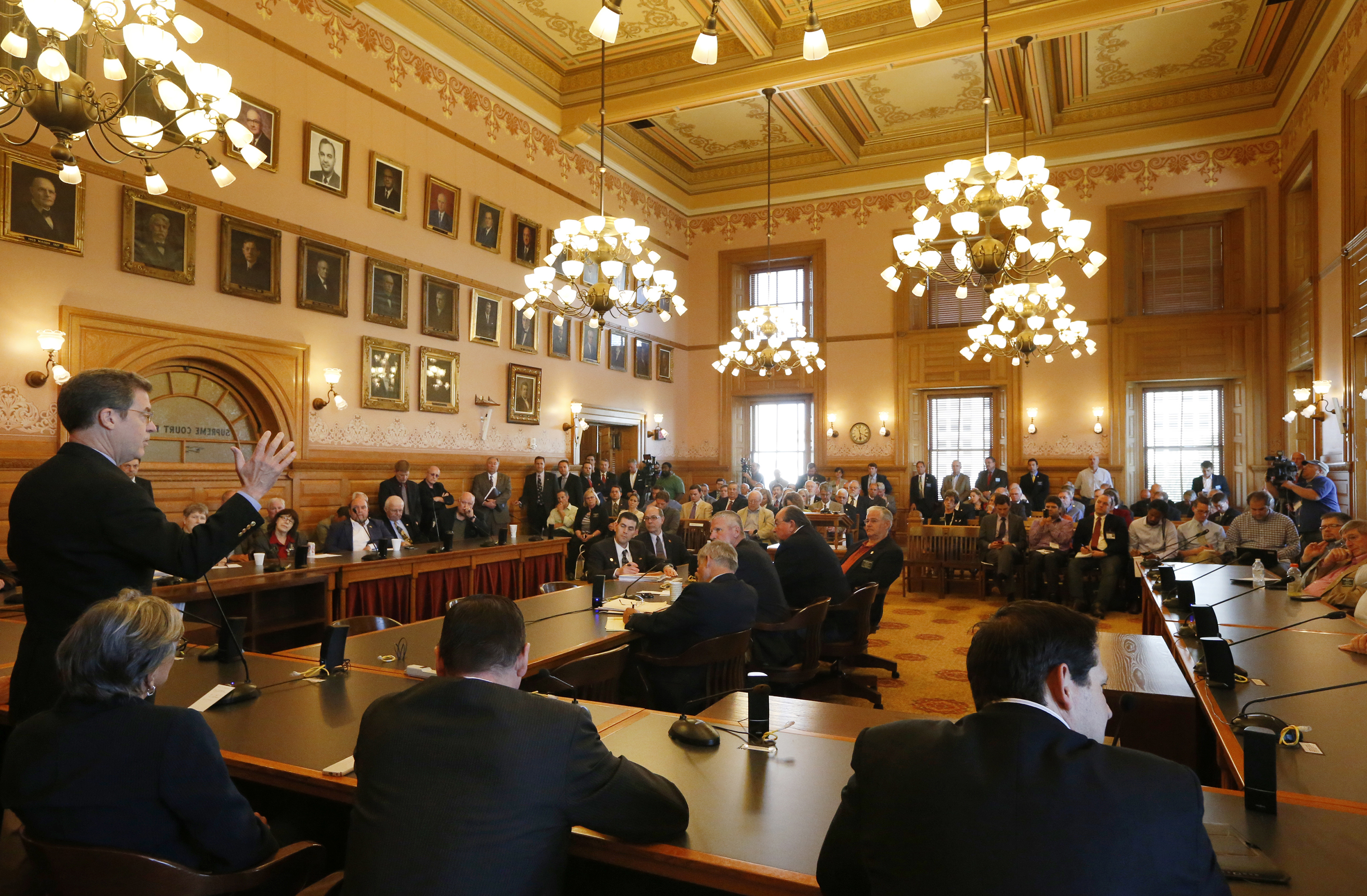 Kansas Gov. Sam Brownback addresses members of state legislature