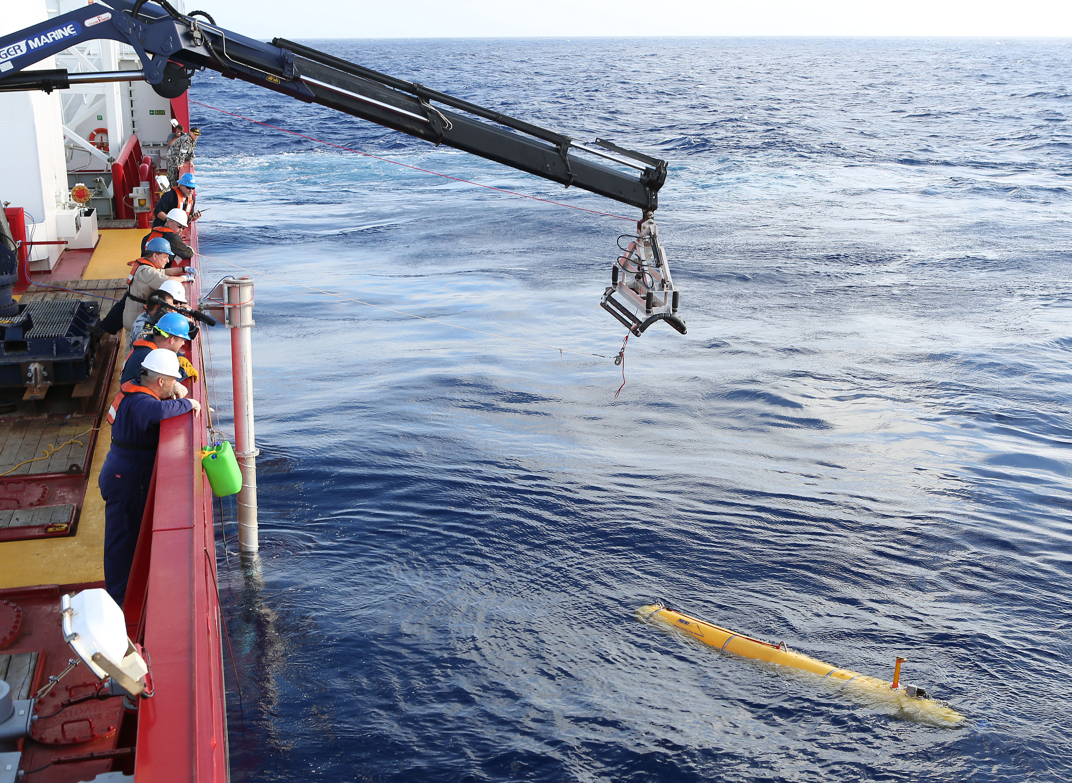 In this handout image provided by Commonwealth of Australia, Department of Defence, Phoenix Autonomous Underwater Vehicle (AUV) Bluefin-21 is craned over the side of Australian Defence Vessel Ocean Shield in the search for missing Malaysia Airlines flight MH 370 on April 14, 2014. (Handout&mdash;Getty Images)