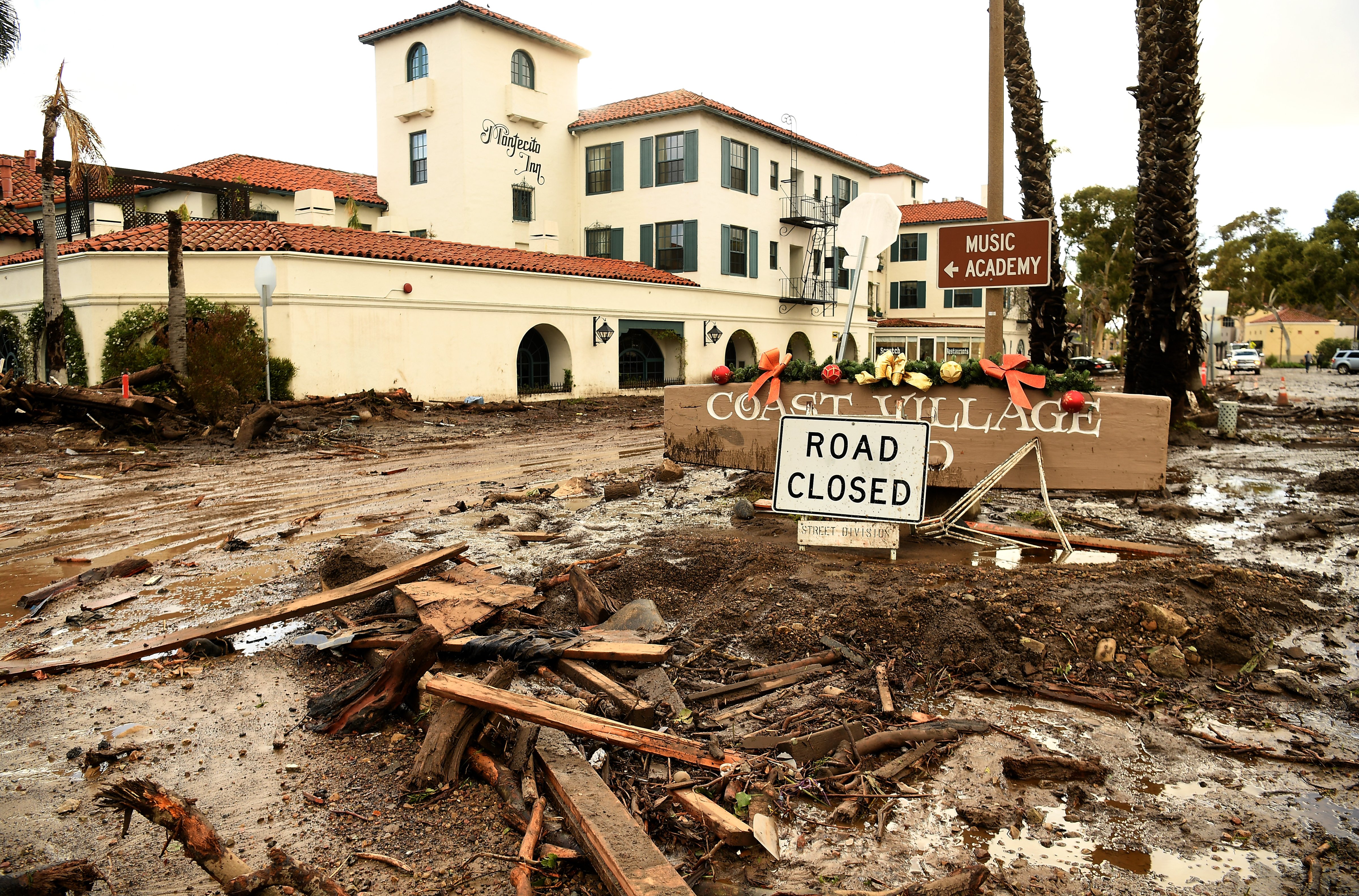 Mud and debris gather outside the Montecito Inn along Olive Mill Road in Montecito after a major storm hit the burn area January 9, 2018 in Montecito, California. (Wally Skalij—LA Times via Getty Images)