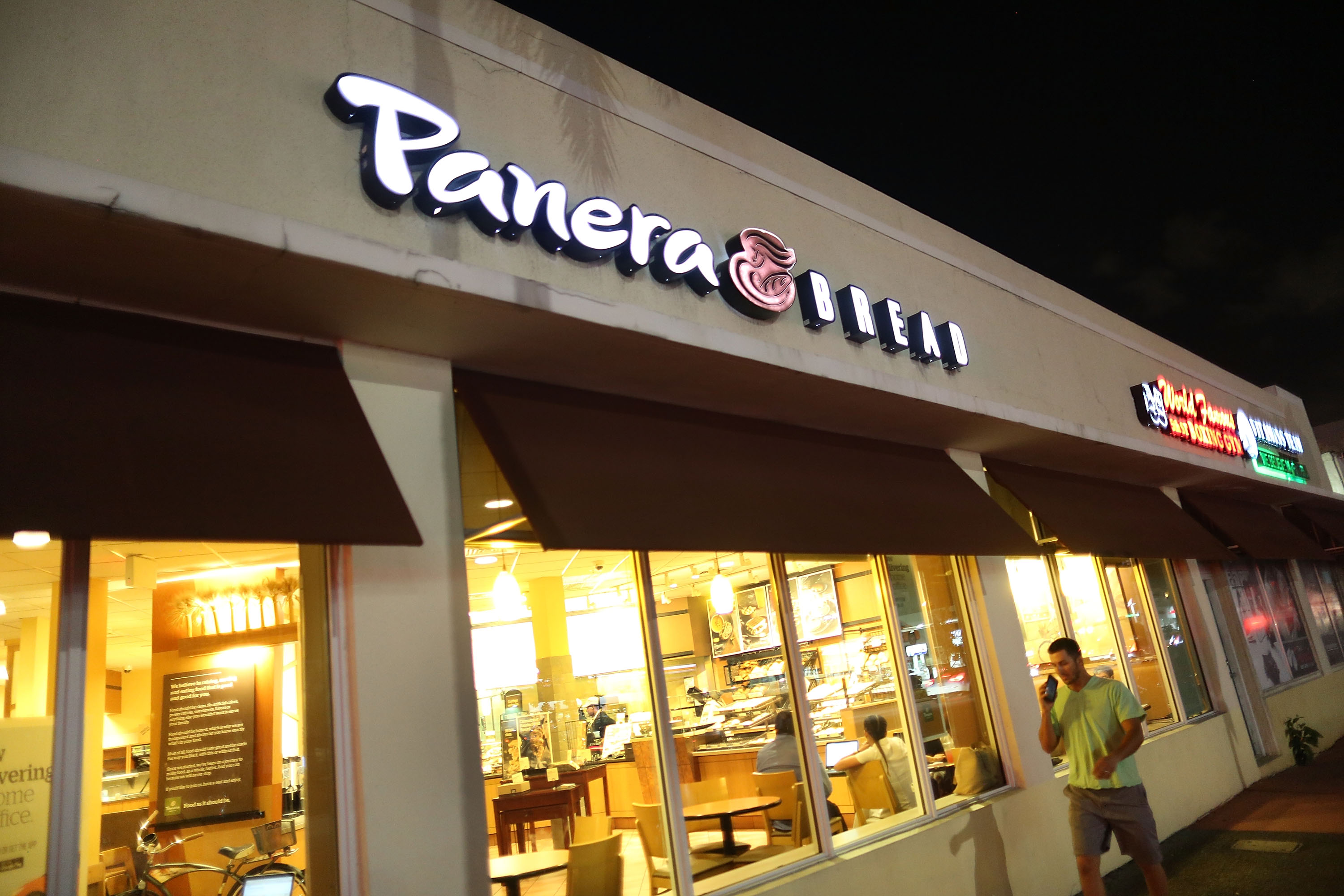 A Panera Bread restaurant is seen on the day it is announced that the Panera Bread company is acquiring sandwich rival Au Bon Pain on November 8, 2017 in Miami Beach, Florida. (Joe Raedle—Getty Images)
