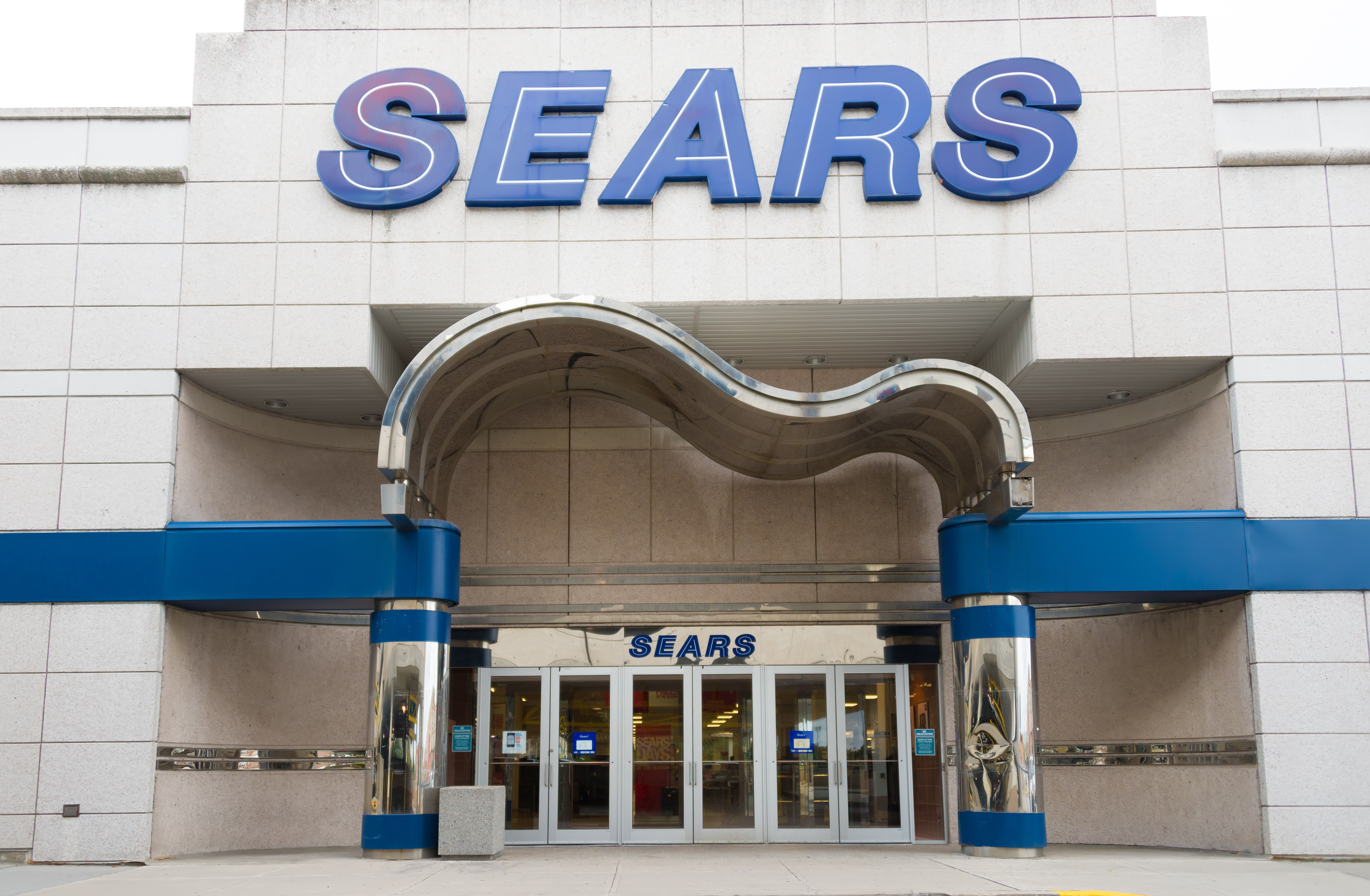 Sears store entrance. Sears, Roebuck &amp; Co. is an American
