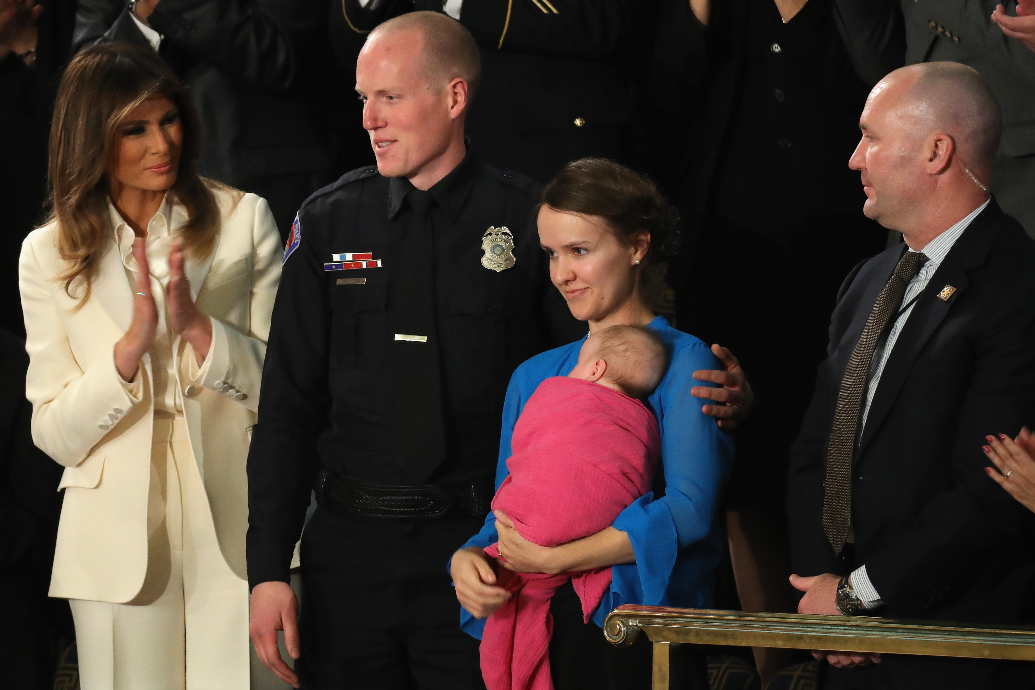 First lady Melania Trump claps for Police officer Ryan Holets and his wife during the State of the Union address in the chamber of the U.S. House of Representatives January 30, 2018 in Washington, DC. (Chip Somodevilla&mdash;Getty Images)