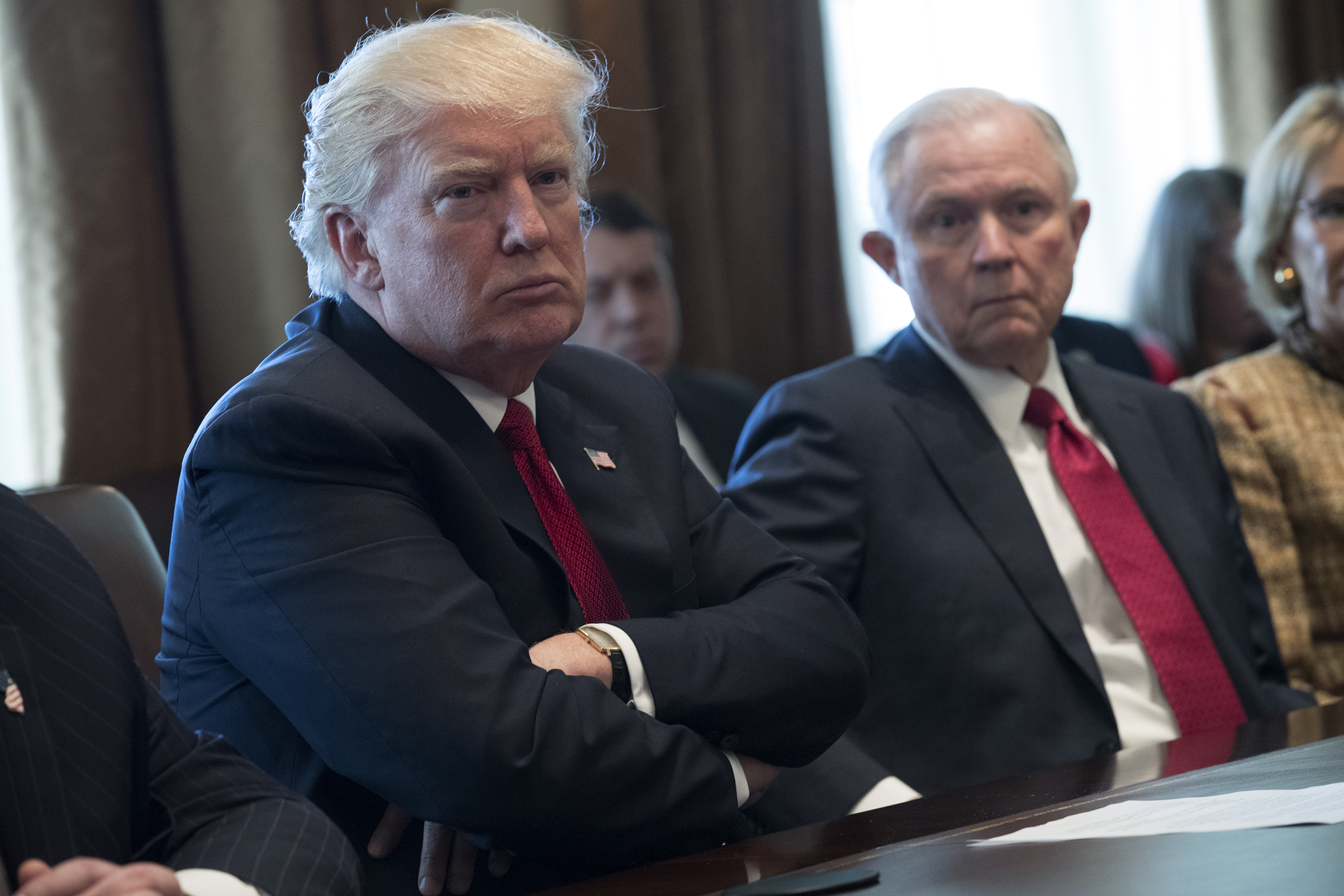 U.S. President Donald Trump (L) and Attorney General Jeff Sessions (R) attend a panel discussion on an opioid and drug abuse in the Roosevelt Room of the White House March 29, 2017 in Washington, DC. (Shawn Thew—Getty Images)