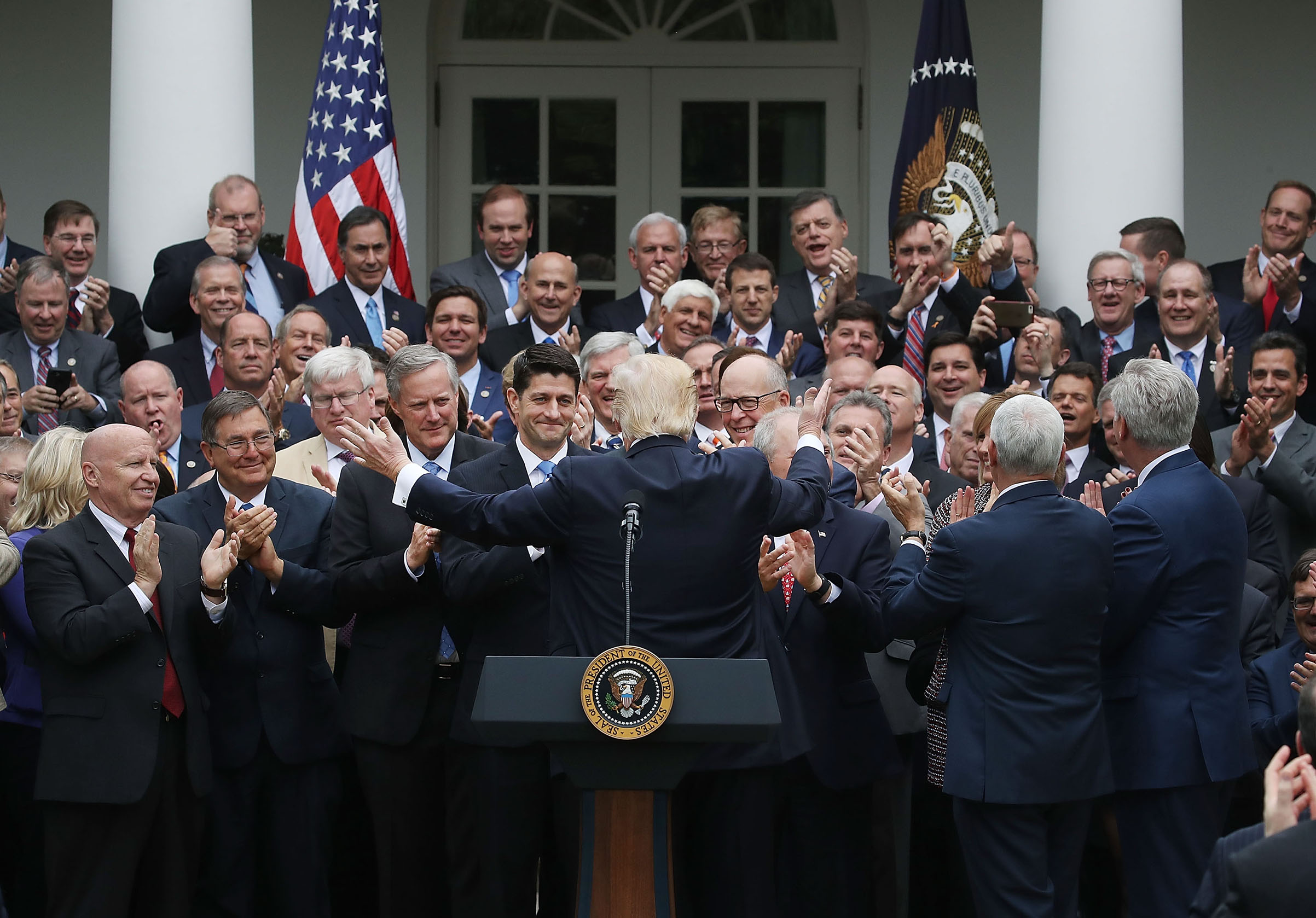 President Donald Trump congratulates House Republicans after they passed legislation aimed at repealing and replacing ObamaCare on May 4, 2017. (Mark Wilson—Getty Images)