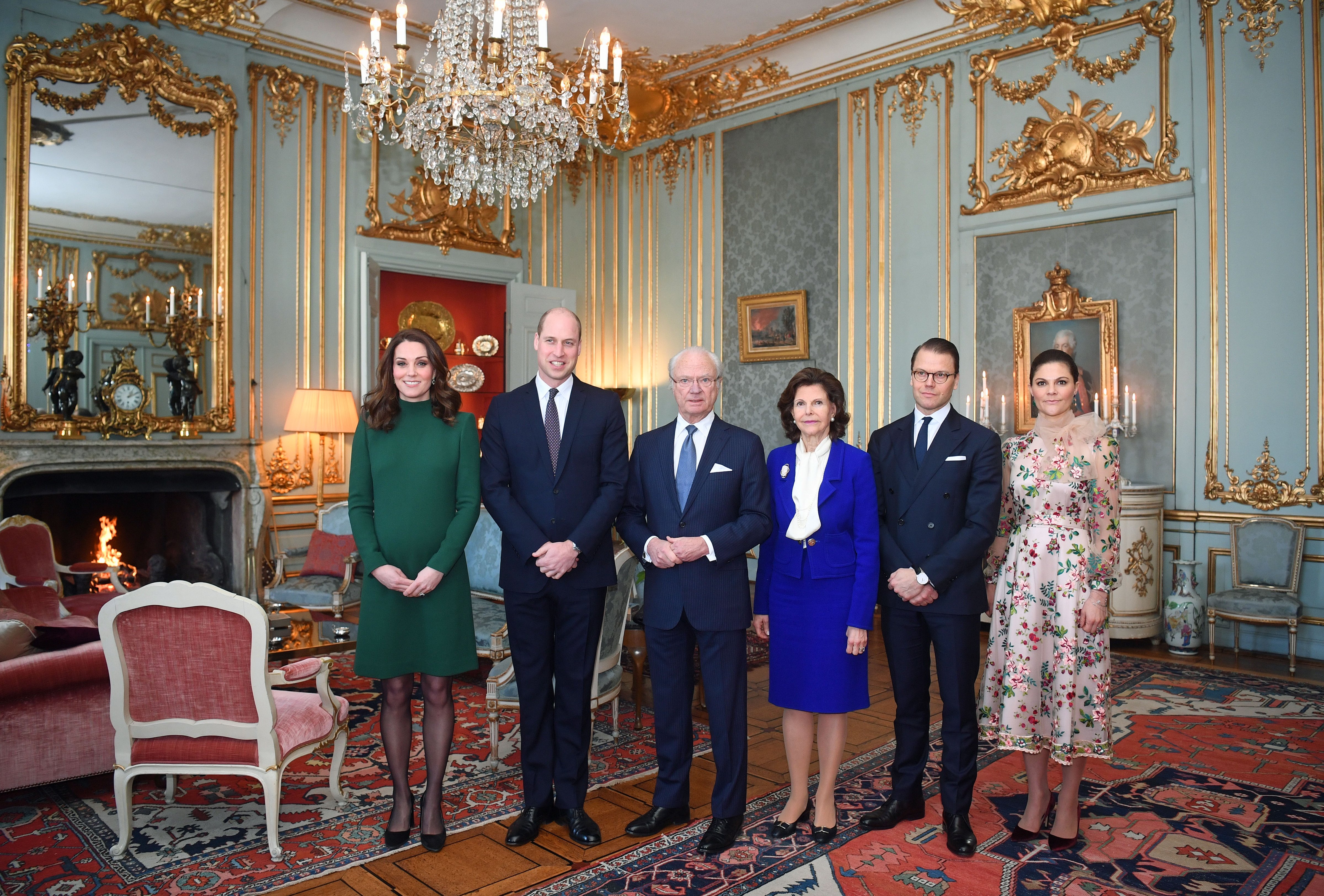 STOCKHOLM, SWEDEN - JANUARY 30: Catherine, Duchess of Cambridge and Prince William, Duke of Cambridge pose with King Carl XVI Gustaf of Sweden, Queen Silvia of Sweden, Prince Daniel, Duke of Vastergotland and Crown Princess Victoria of Sweden ahead of a lunch at the Royal Palace of Stockholm during day one of their Royal visit to Sweden on January 30, 2018 in Stockholm, Sweden. (Photo by Victoria Jones-Pool/Getty Images) (Pool—Getty Images)
