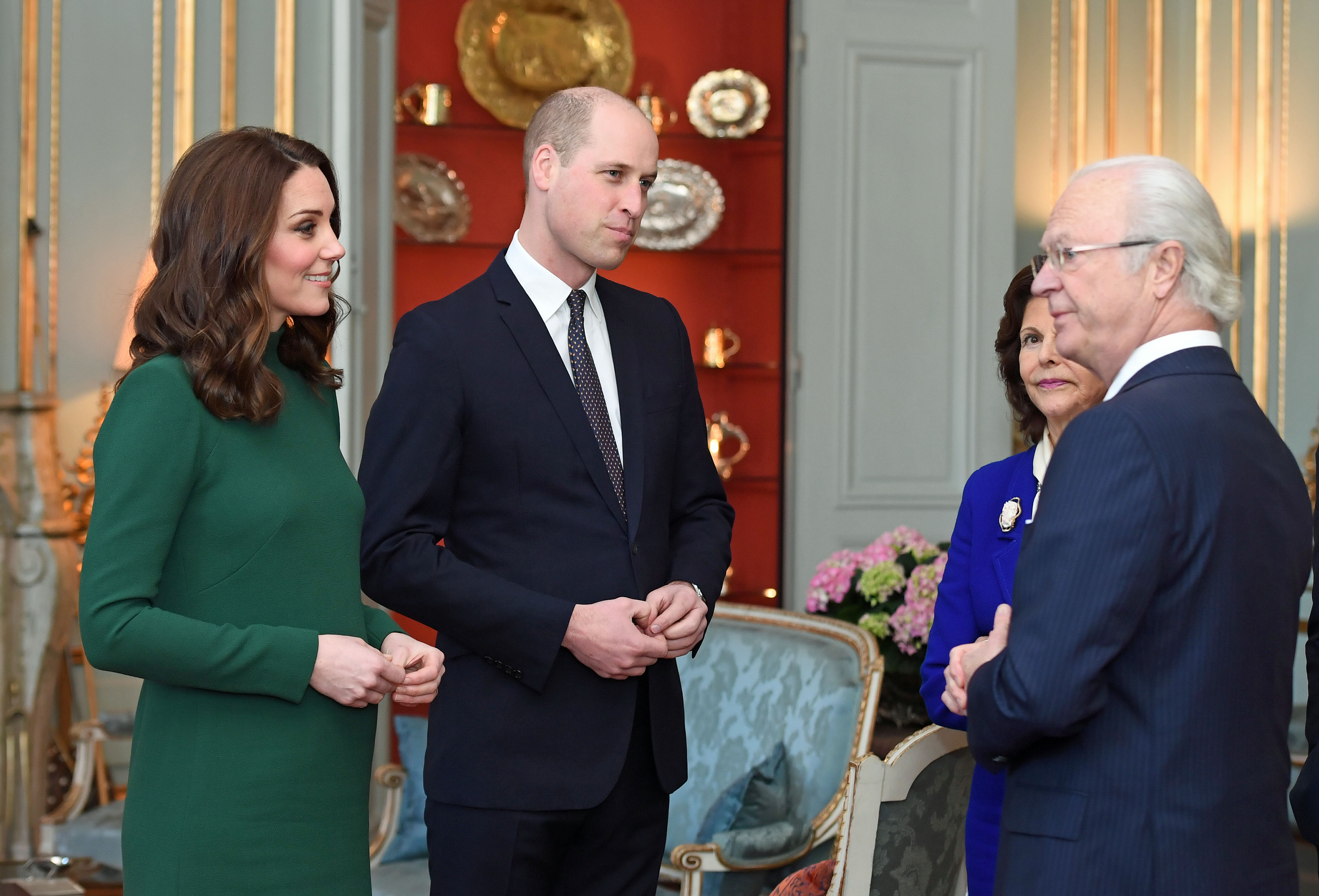 STOCKHOLM, SWEDEN - JANUARY 30: Catherine, Duchess of Cambridge and Prince William, Duke of Cambridge are greeted by King Carl XVI Gustaf of Sweden, Queen Silvia of Sweden ahead of a lunch at the Royal Palace of Stockholm during day one of their Royal visit to Sweden on January 30, 2018 in Stockholm, Sweden. (Photo by Victoria Jones-Pool/Getty Images) (Pool—Getty Images)