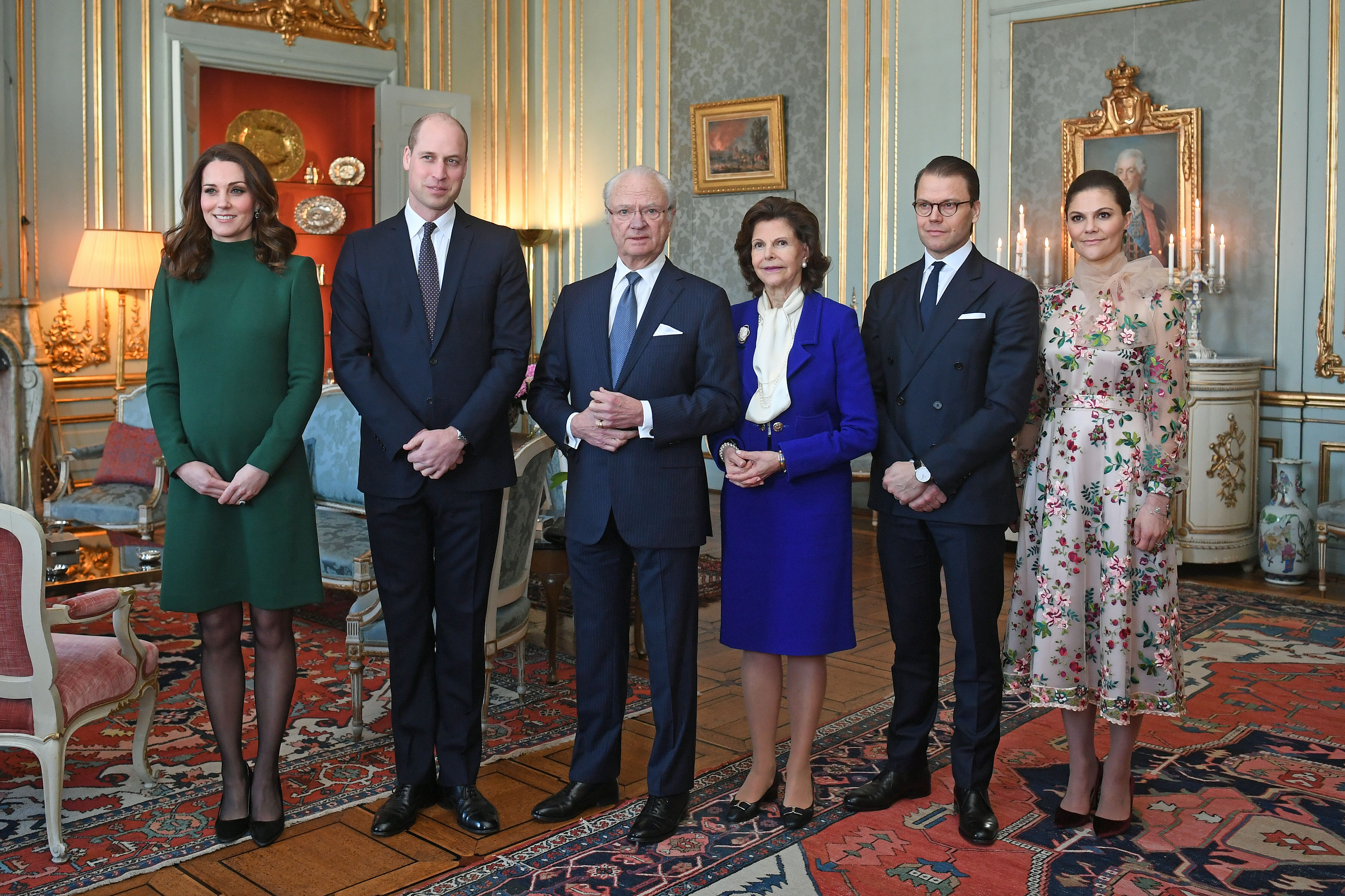 Catherine, Duchess of Cambridge and Prince William, Duke of Cambridge pose with King Carl XVI Gustaf of Sweden, Queen Silvia of Sweden, Prince Daniel, Duke of Vastergotland and Crown Princess Victoria of Sweden ahead of a lunch at the Royal Palace of Stockholm during day one of their Royal visit to Sweden on January 30, 2018 in Stockholm, Sweden. (Pool—Getty Images)