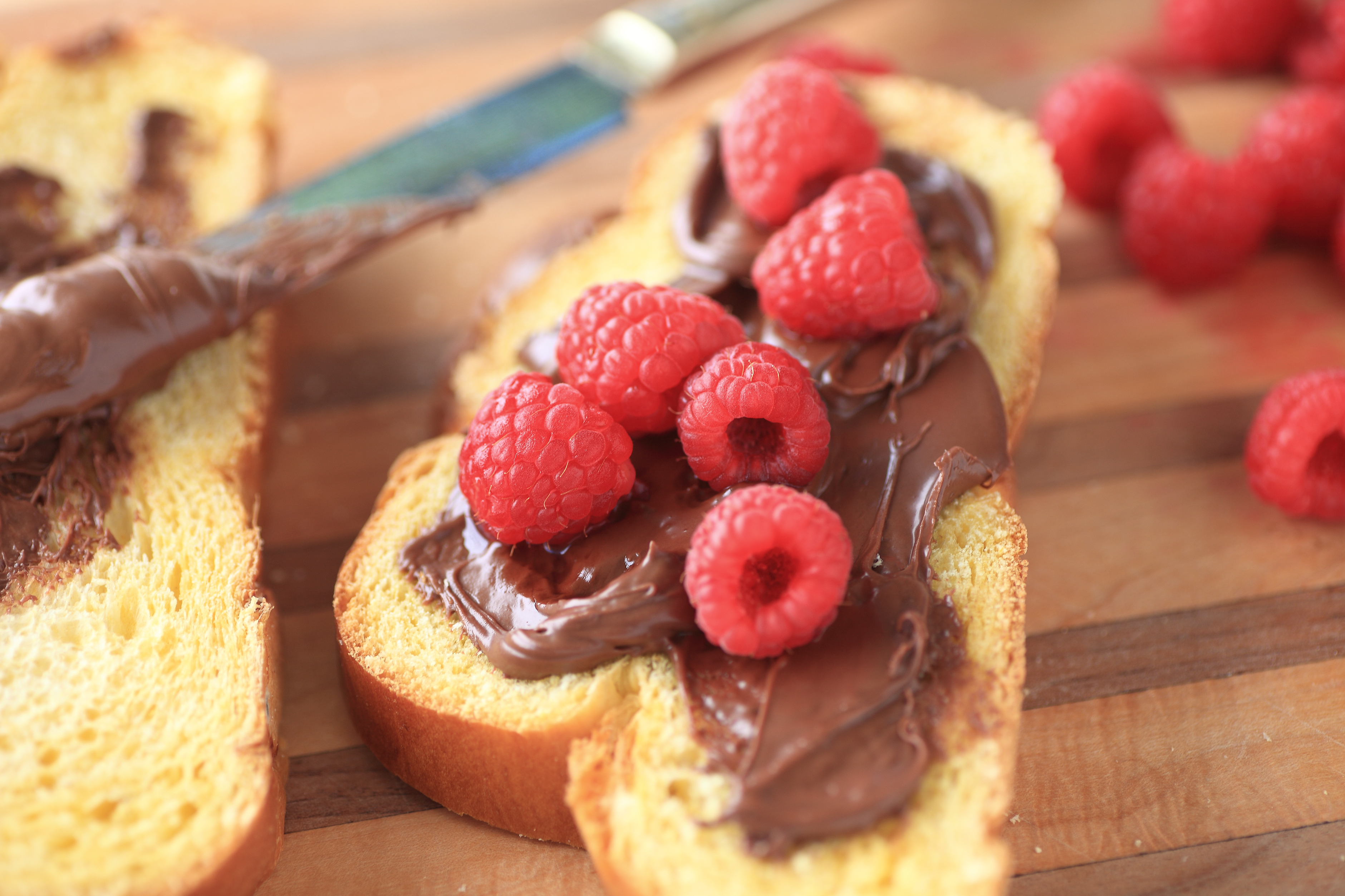 Raspberries With Nutella On Bread Slices
