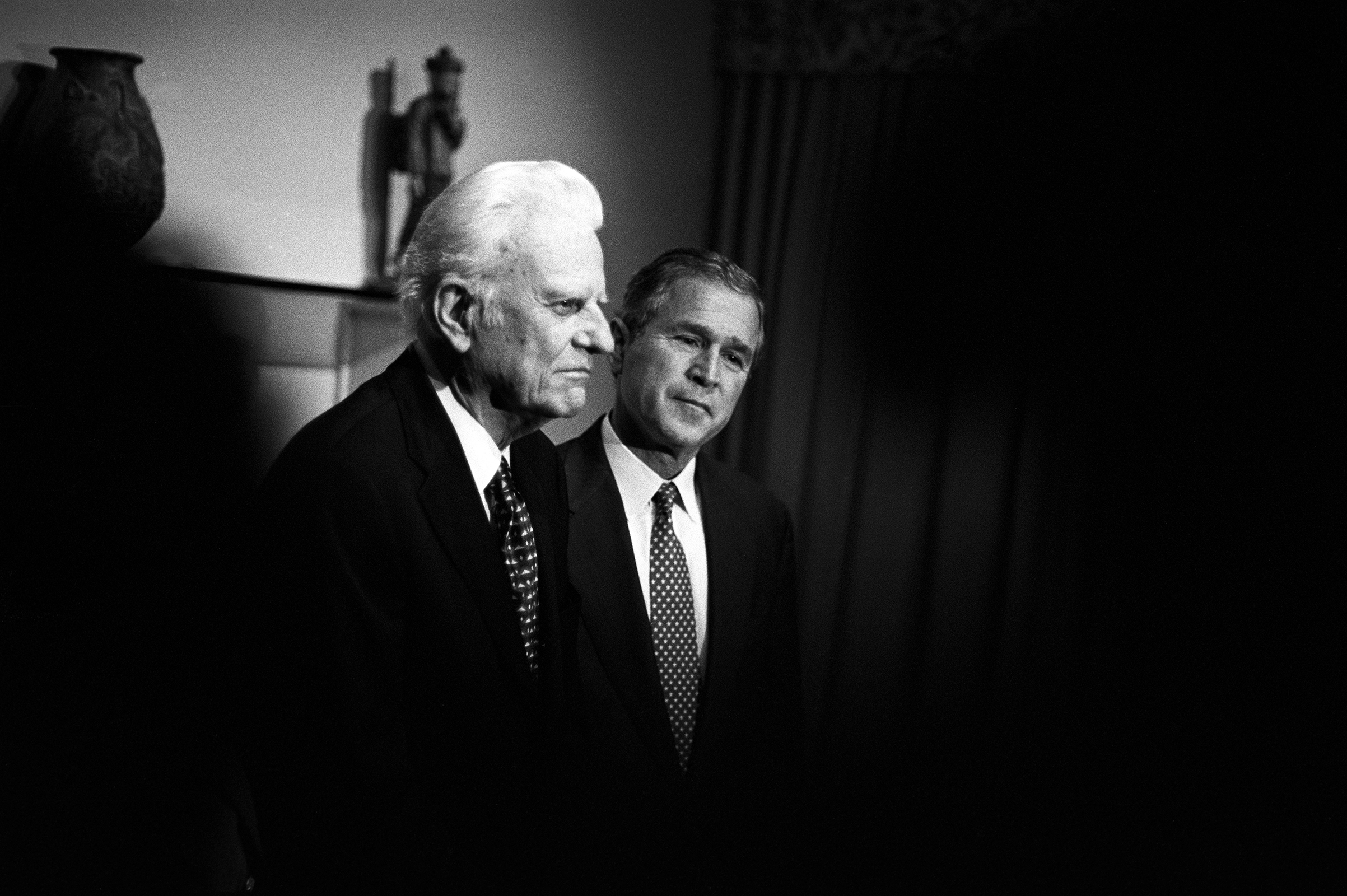 Billy Graham meets privately with Texas Governor and Republican presidential candidate George W. Bush in Jacksonville, Fla., on Nov. 5, 2000. Graham gave his tacit endorsement to Bush's run for the presidency after the two talked about faith and the future of the country. (Charles Ommanney—Getty Images)
