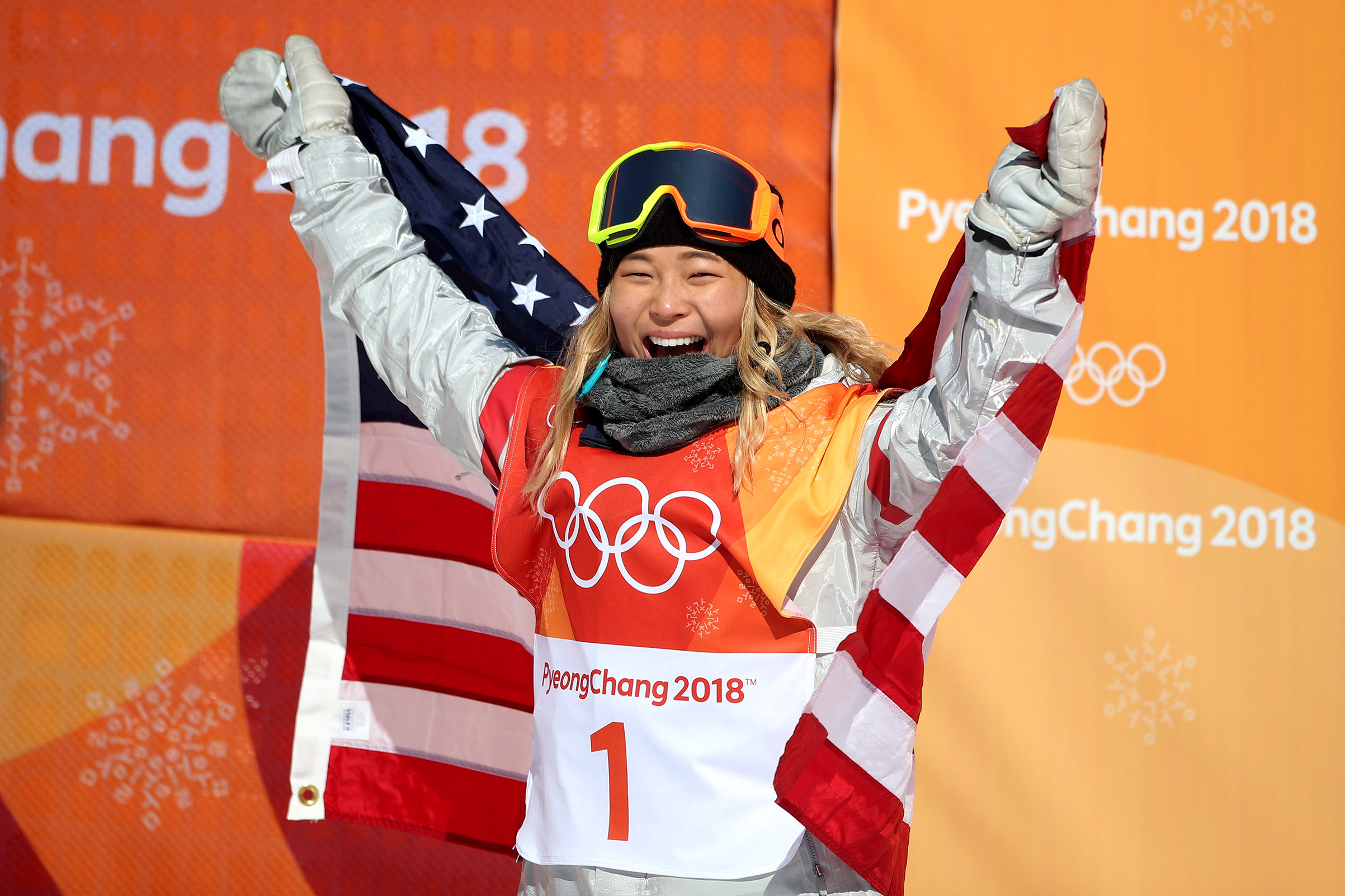 Gold medalist Chloe Kim of the United States celebrates her gold medal win during the Snowboard Ladies' Halfpipe competition on Feb. 13, 2018. (Tim Clayton—Corbis/Getty Images:)