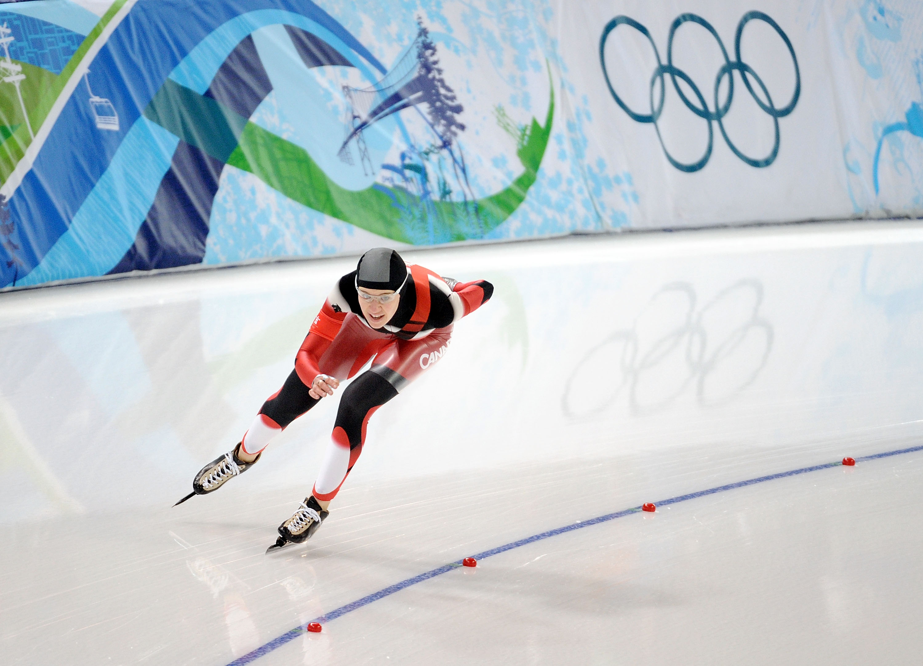 Clara Hughes of Canada on the ice during the Ladies' 5000m Speed Skating finals during the 2010 Vancouver Winter Olympics in Canada. Harry How—Getty Images (Harry How—Getty Images)