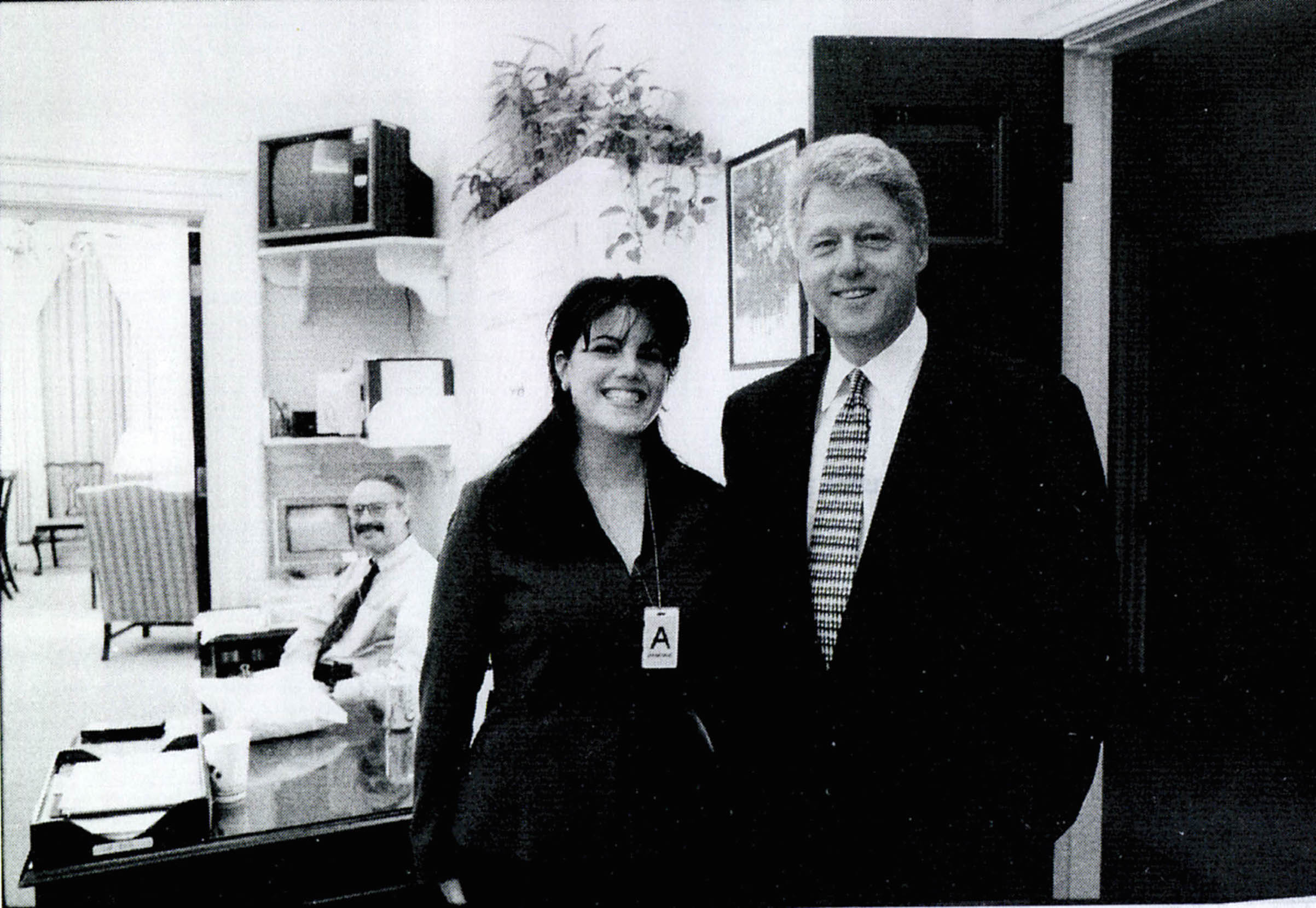 A photograph showing former White House intern Monica Lewinsky meeting President Bill Clinton at a White House function, submitted as evidence in documents by the Starr investigation and released by the House Judiciary committee Sept. 21, 1998. (Getty Images)
