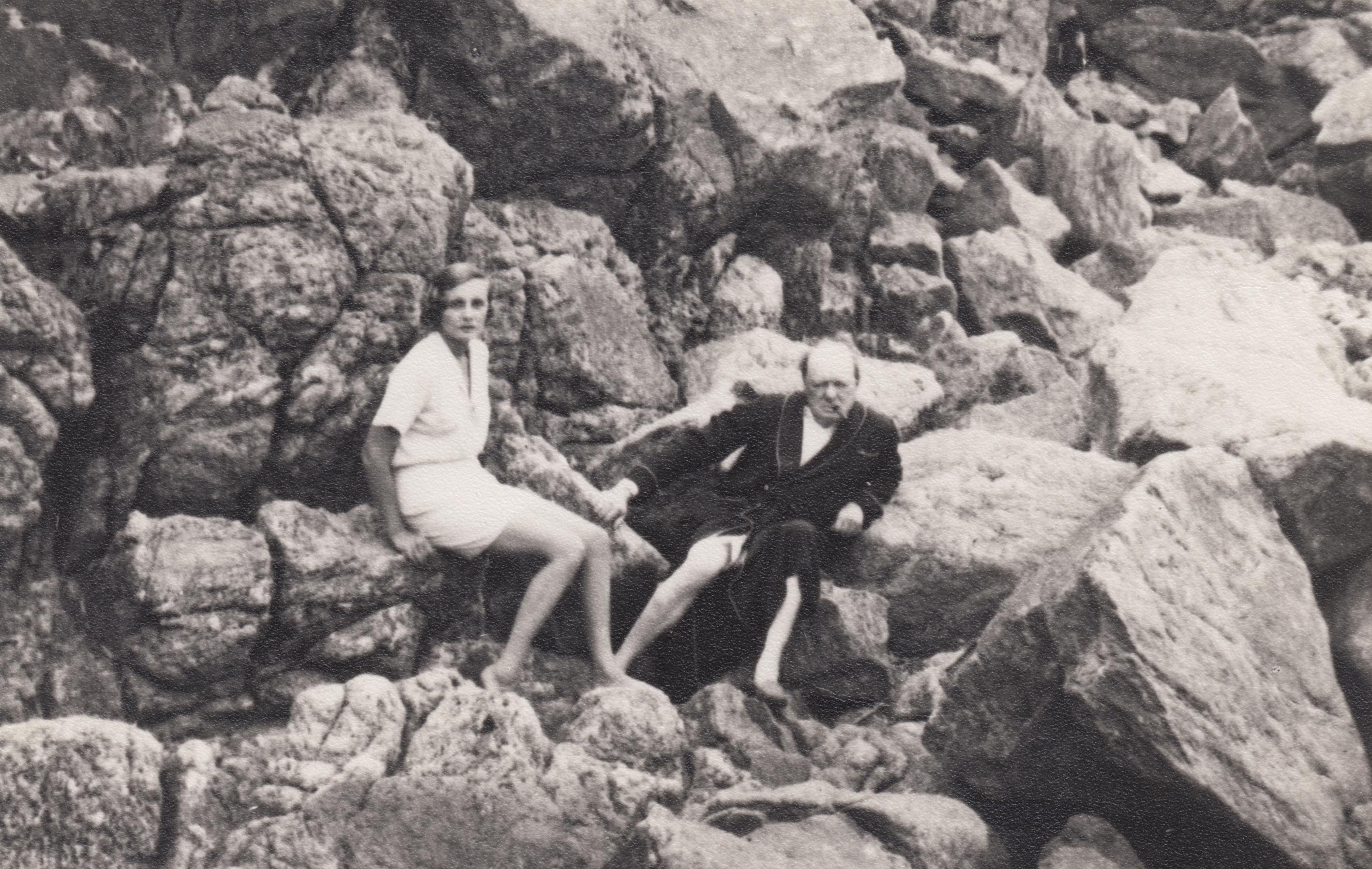 Doris Castlerosse and Churchill on a beach near Chateau de L’Horizon mid 1930s. (Production Company—Production Company/ 
                      Channel 4.)