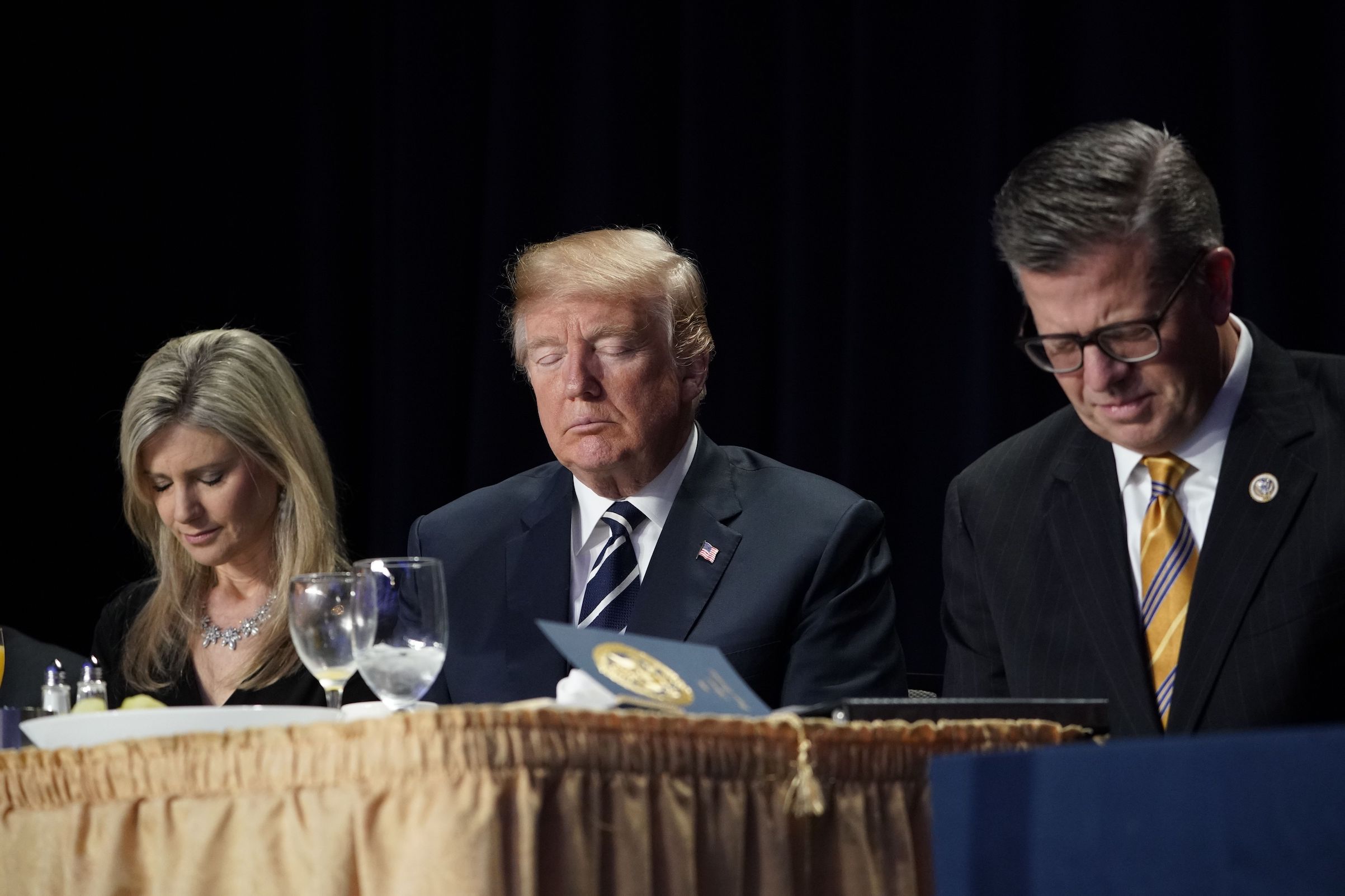 U.S. President Donald Trump (C) attends the National Prayer Breakfast at a hotel in Washington, D.C., on Feb. 8, 2018. (Mandel Ngan—AFP/Getty Images)