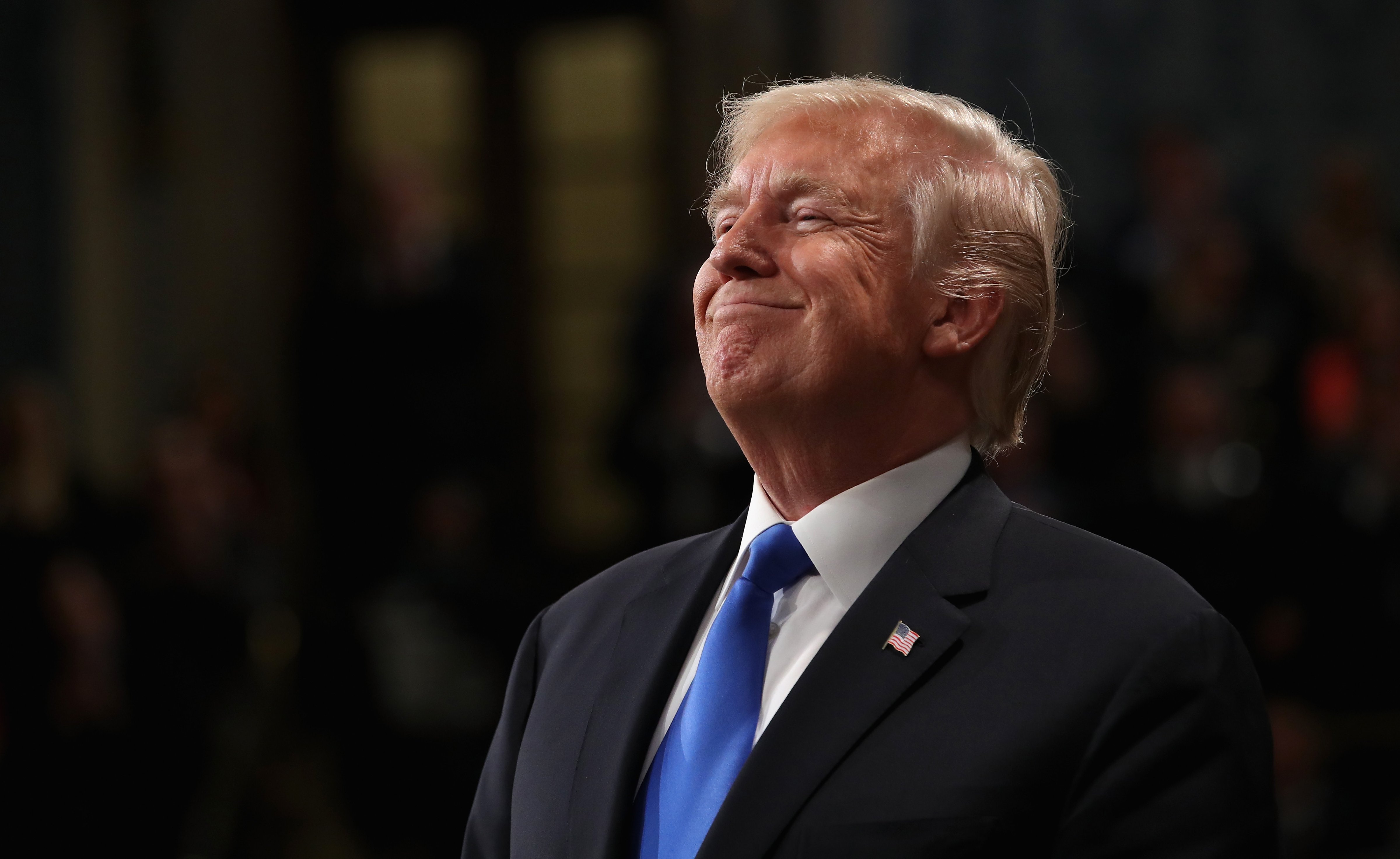 President Donald Trump smiles while delivering the State of the Union address. (Bloomberg&mdash;Bloomberg via Getty Images)
