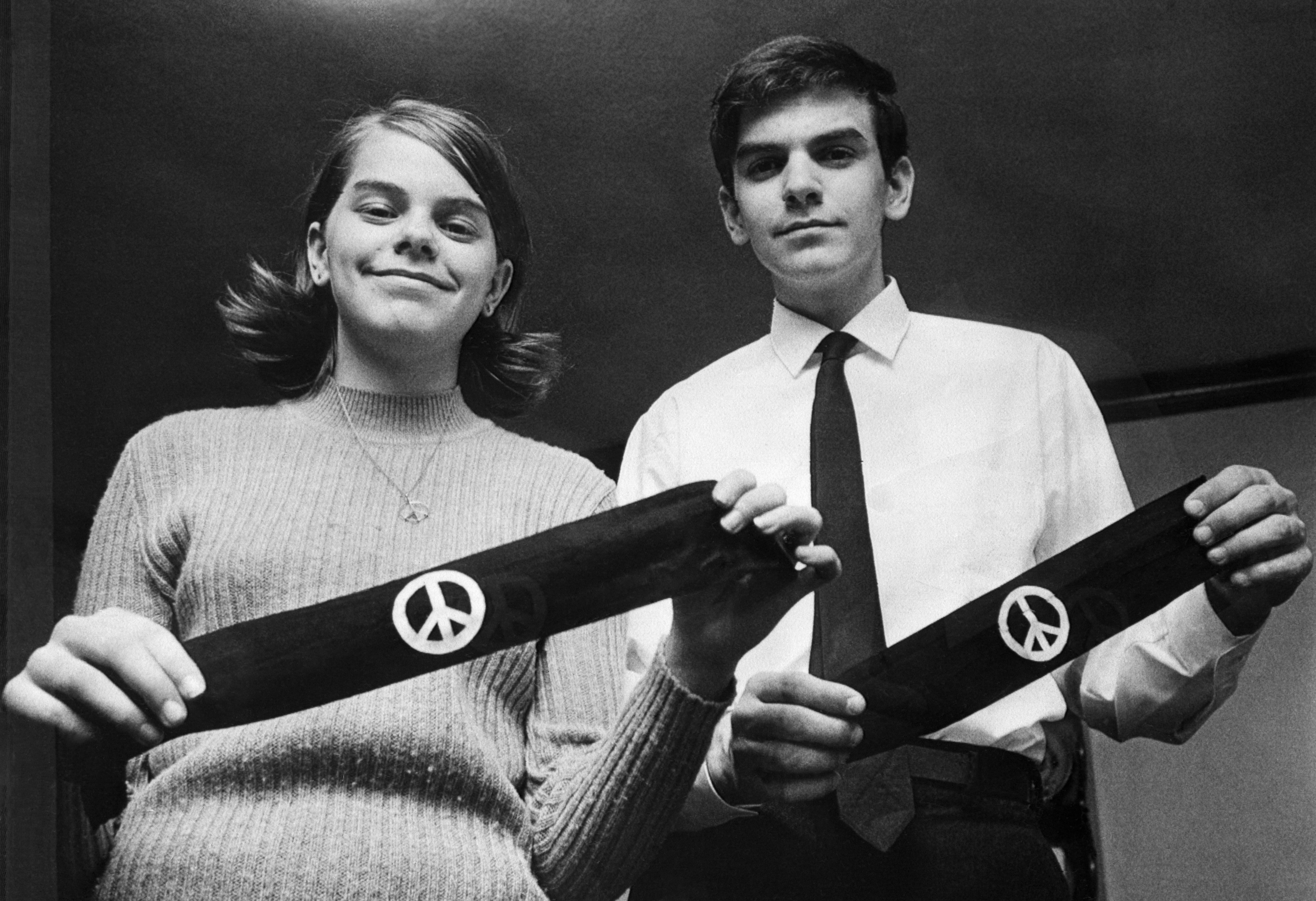 Des Moines, Iowa, students Mary Beth Tinker and her brother, John display two black armbands, the objects of the U.S. Supreme Court's agreement on March 4, 1968, to hear arguments on how far public schools may go in limiting the wearing of political symbols. (Bettmann—Getty Images)