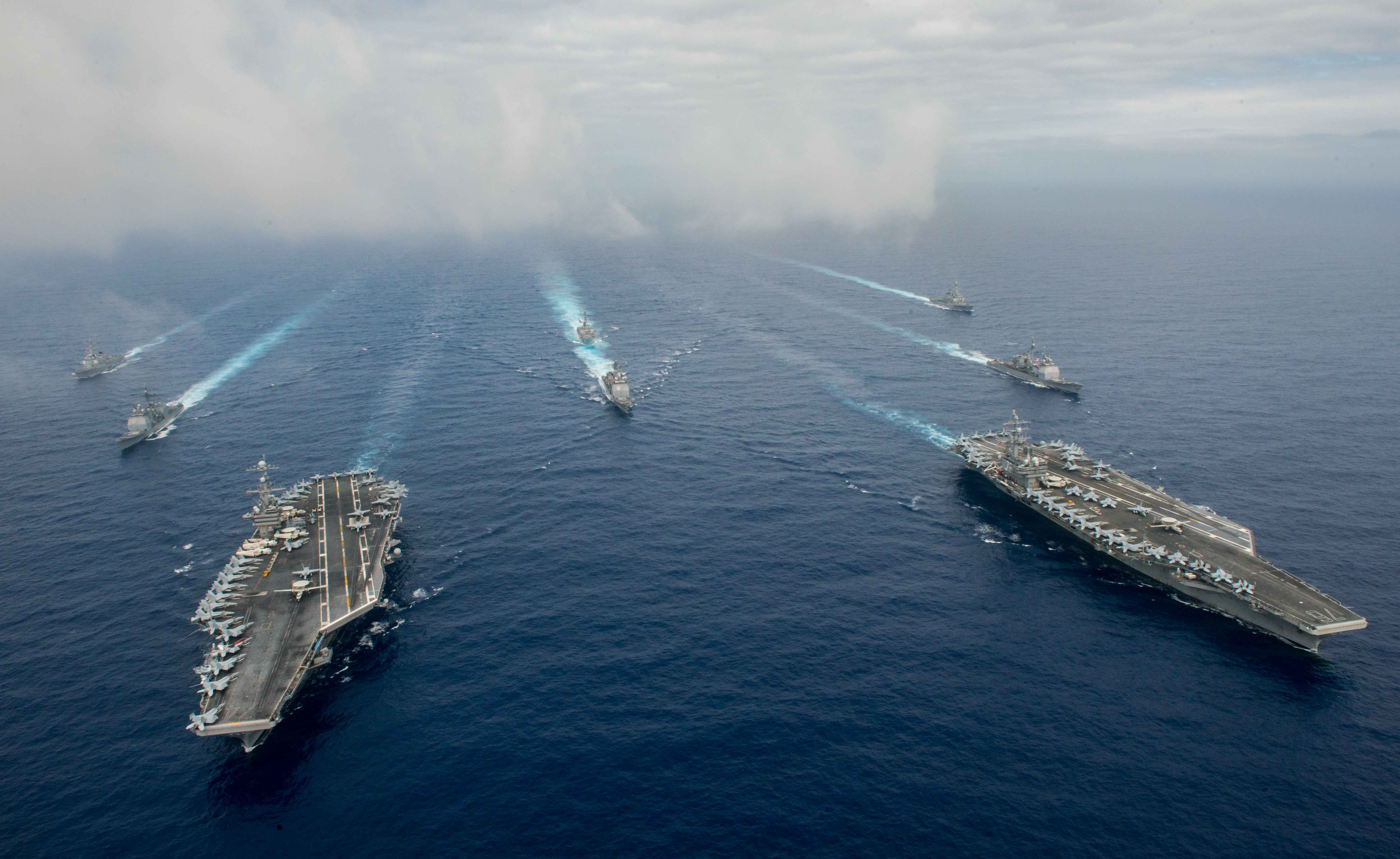 The USS John C. Stennis and USS Ronald Reagan conduct operations in the U.S. 7th Fleet area of operations on June 18, 2016. (Specialist 3rd Class Jake Greenberg—U.S. Navy/Getty Images)