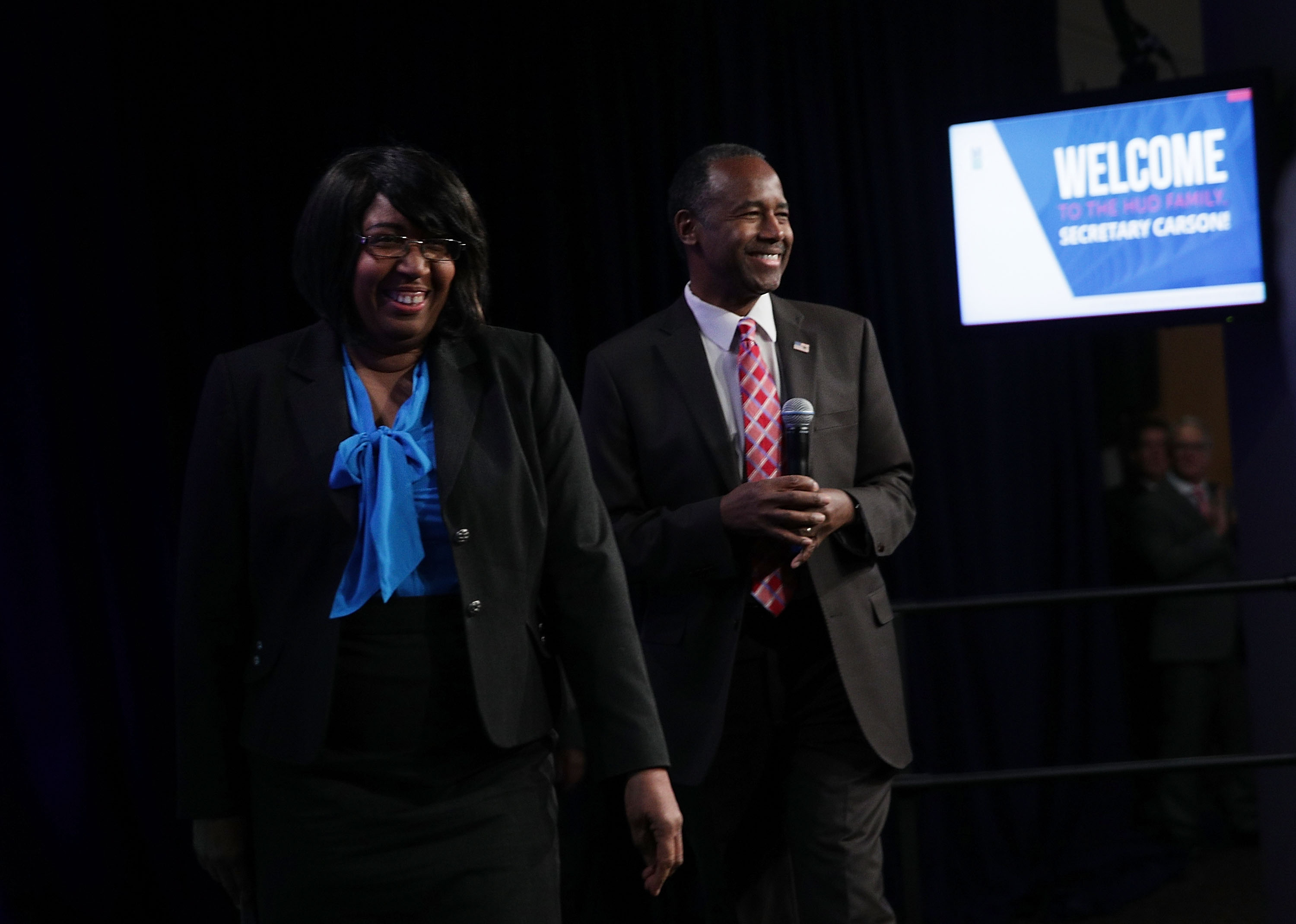 U.S. Housing and Urban Development (HUD) Secretary Ben Carson and his wife Candy Carson walk on stage prior to his address to his employees March 6, 2017 in Washington, DC. (Alex Wong—Getty Images)