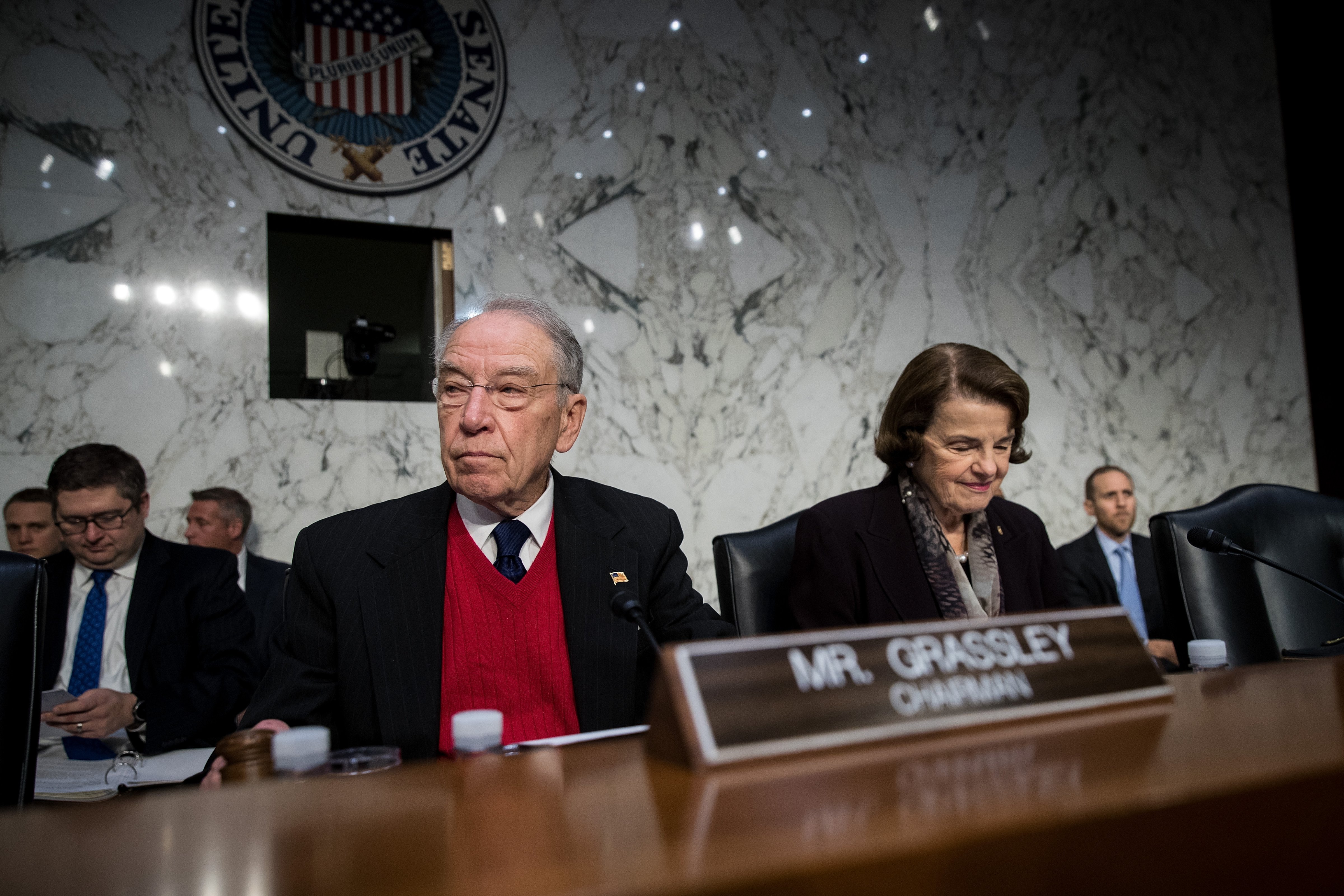 Committee chairman Sen. Chuck Grassley (R-IA) and ranking member Sen. Dianne Feinstein (D-CA) arrive for a Senate Judiciary Committee hearing on Capitol Hill, December 6, 2017 in Washington, DC. (Drew Angerer—Getty Images)