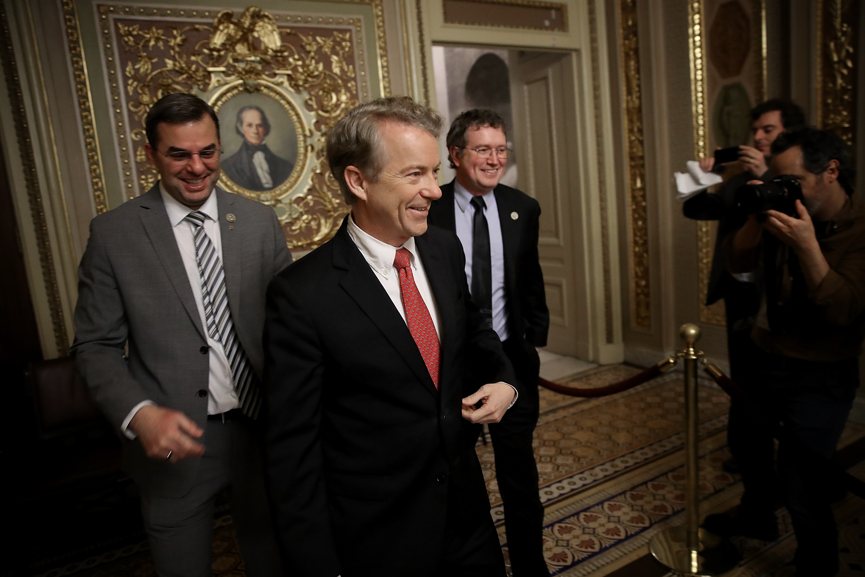 Sen. Rand Paul takes a break from the floor of the U.S. Senate with Rep. Justin Amash and Rep. Thomas Massie at the U.S. Capitol on Feb. 8, 2018. (Win McNamee—Getty Images)